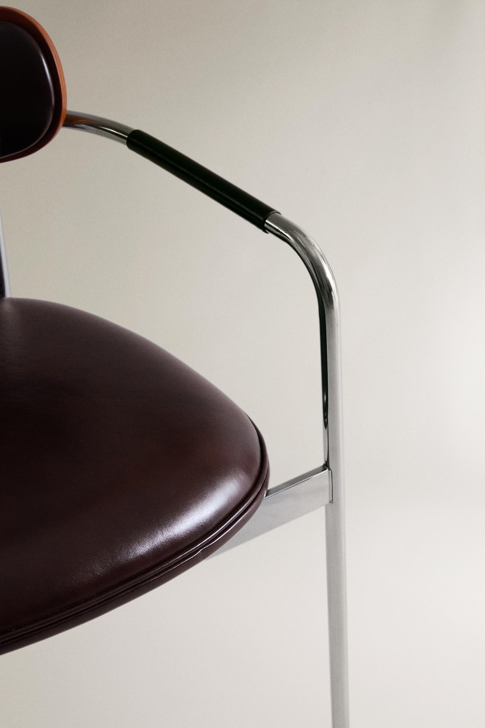 LEATHER AND STAINLESS STEEL CHAIR