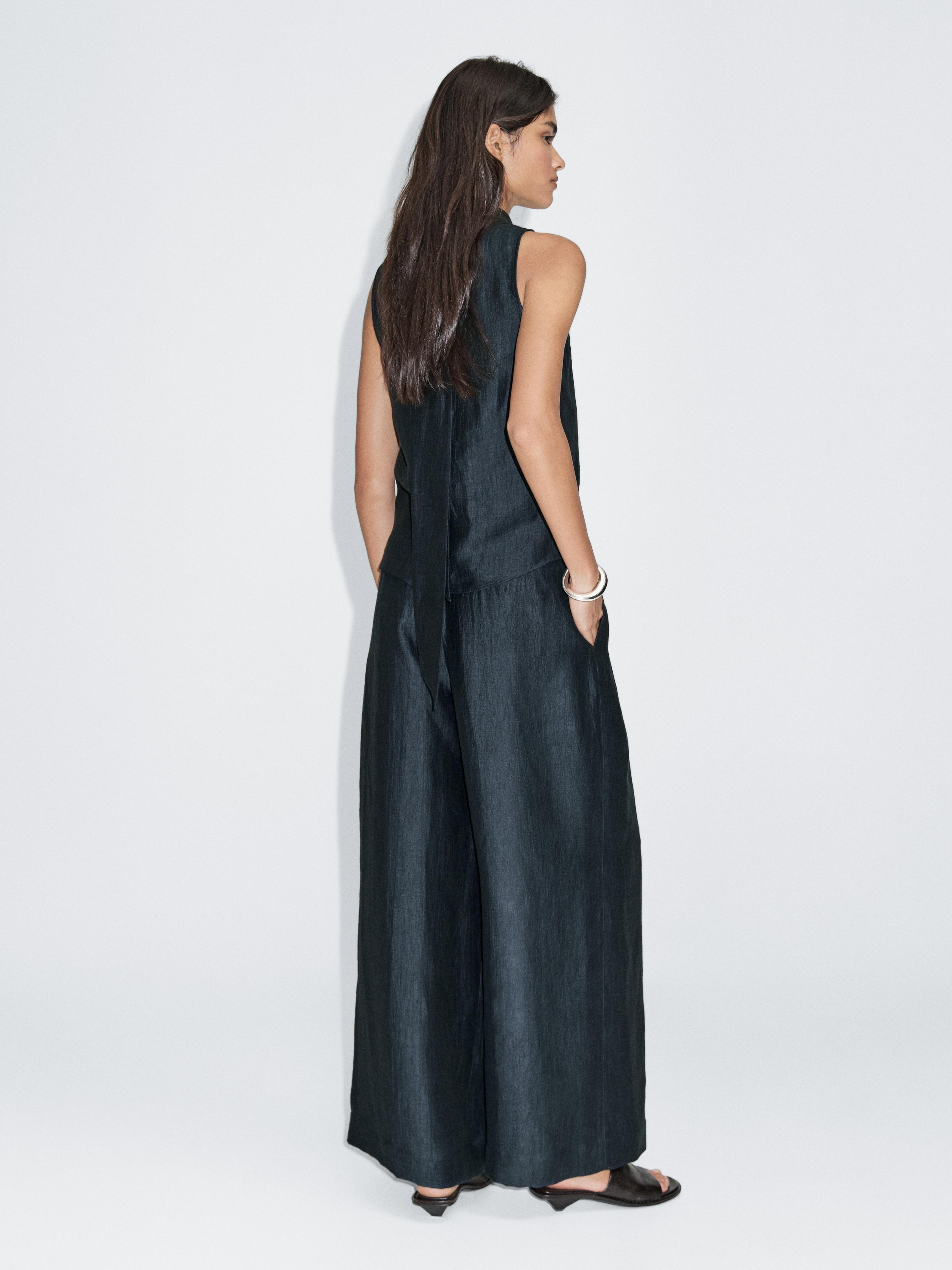 Loose-fitting linen blend trousers