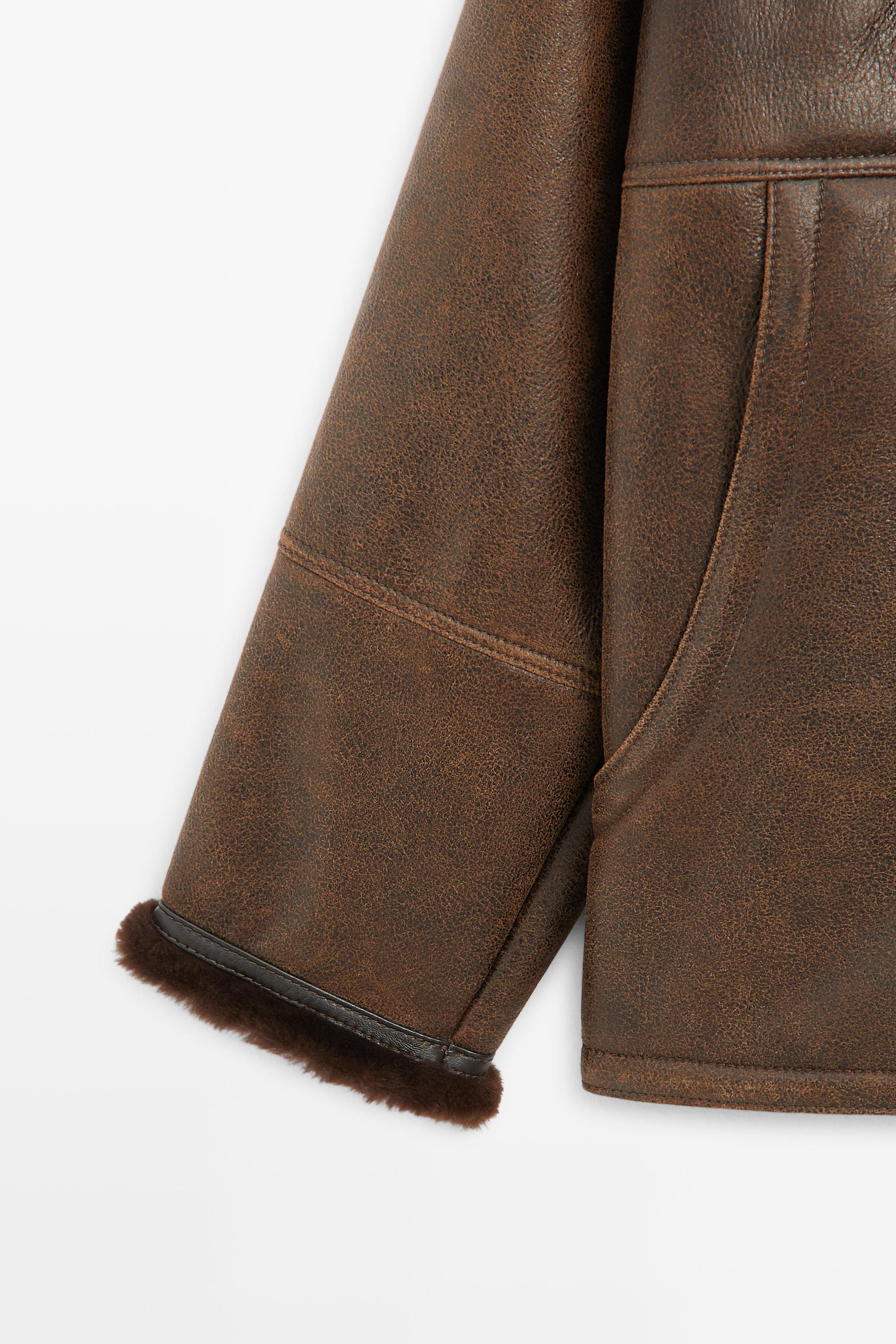 Manteau double face en cuir, daim et fourrure