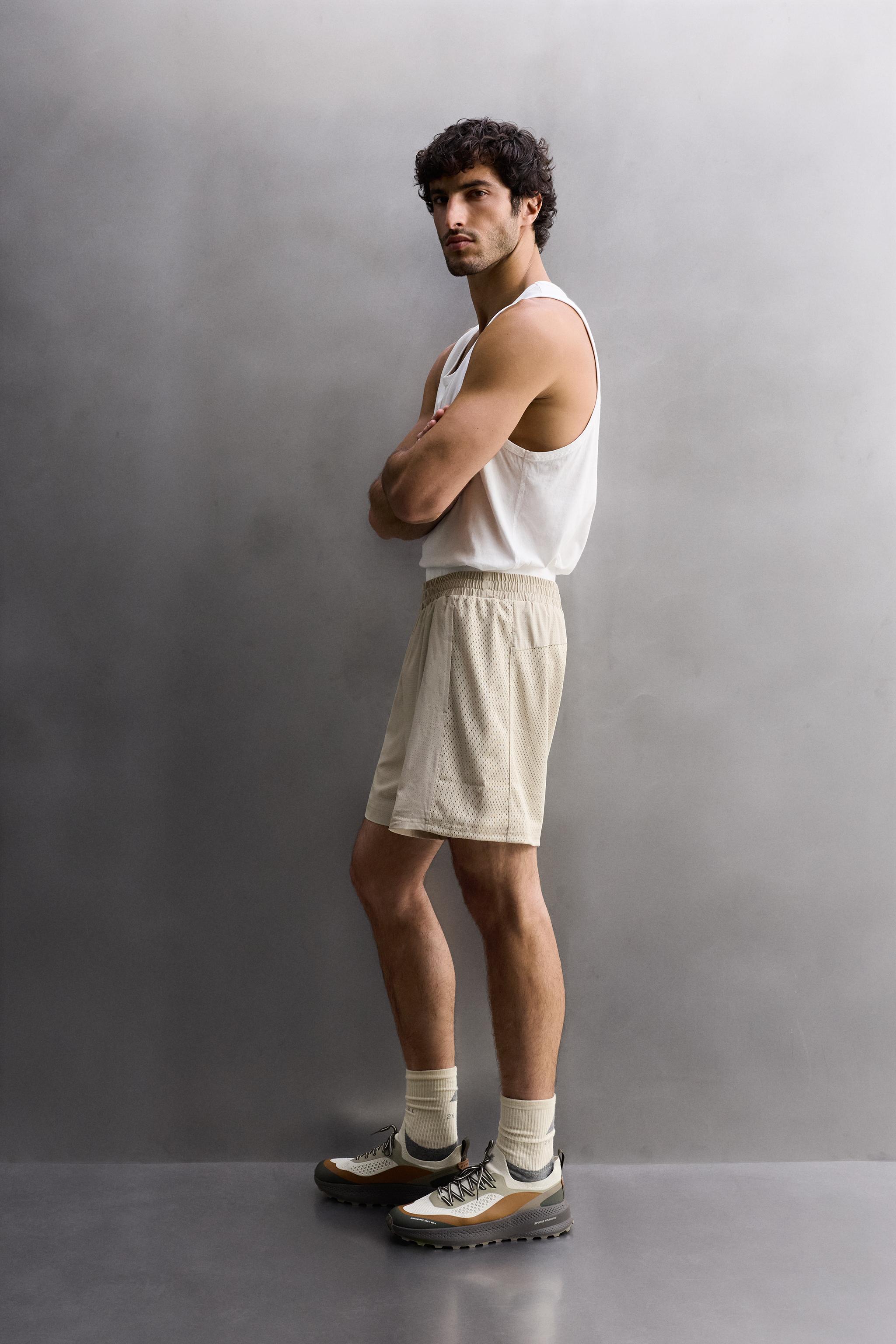 COMBINED PERFORATED SHORTS