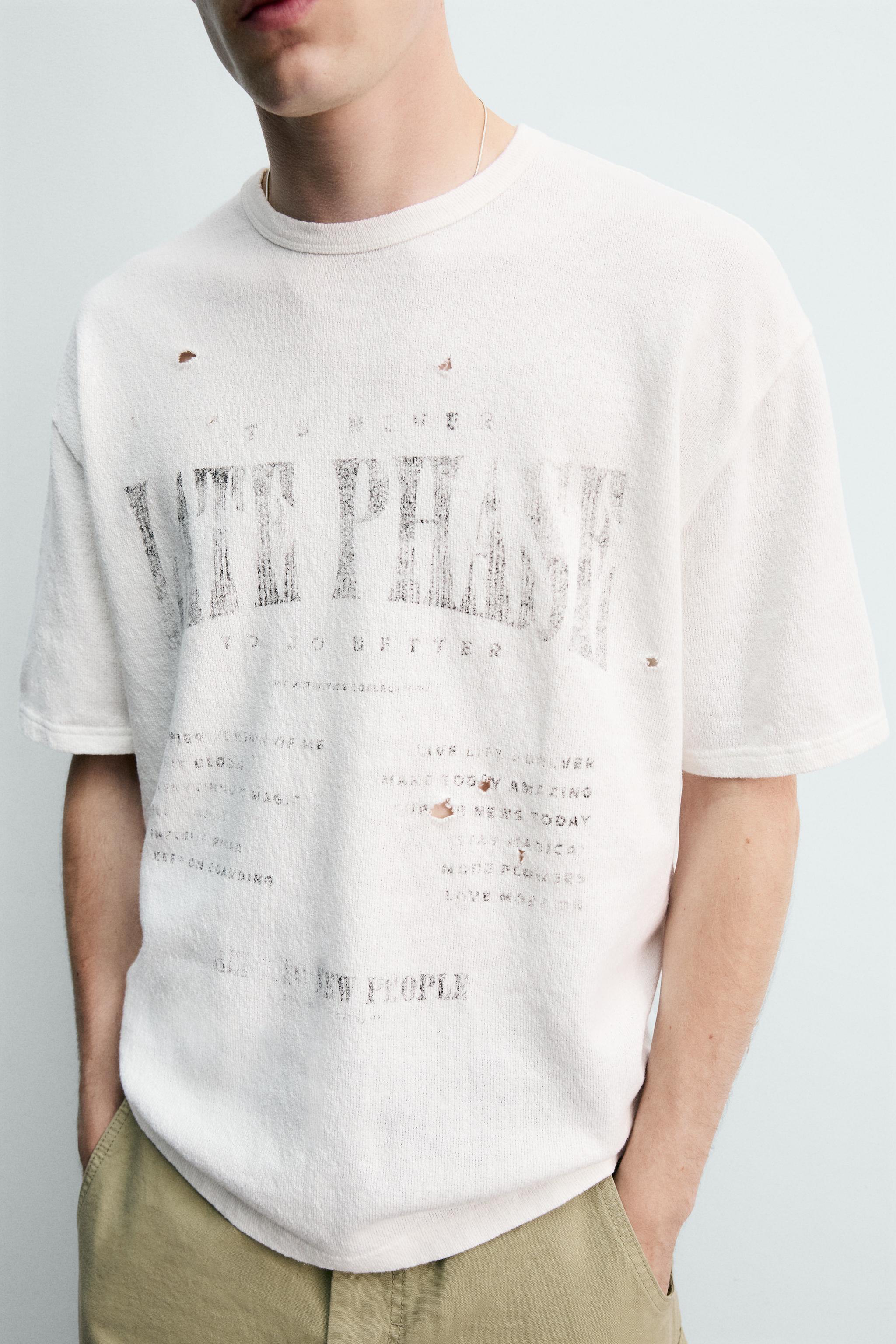 T-SHIRT EN MAILLE À IMPRIMÉS DÉLAVÉS