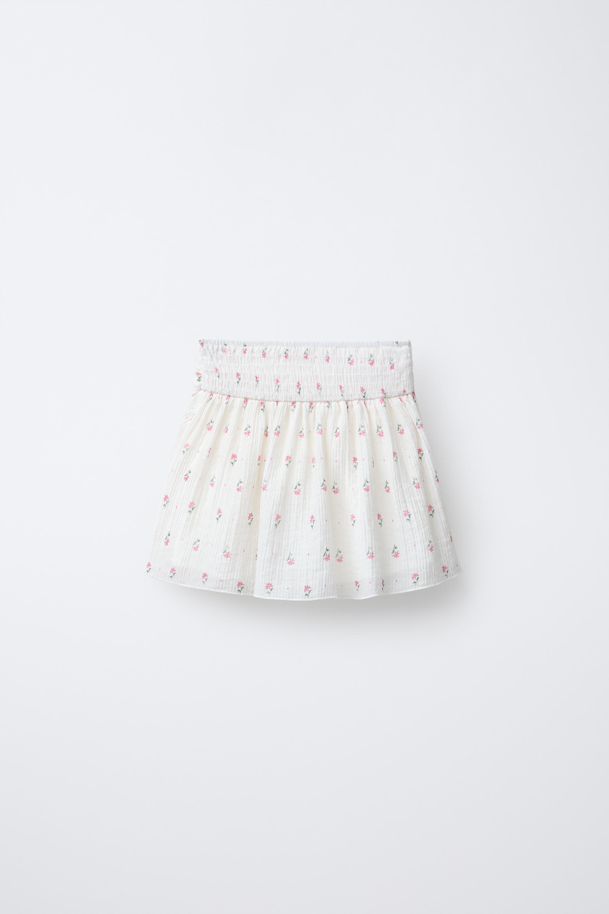 JUPE-SHORT À VOLANTS ET FLEURS