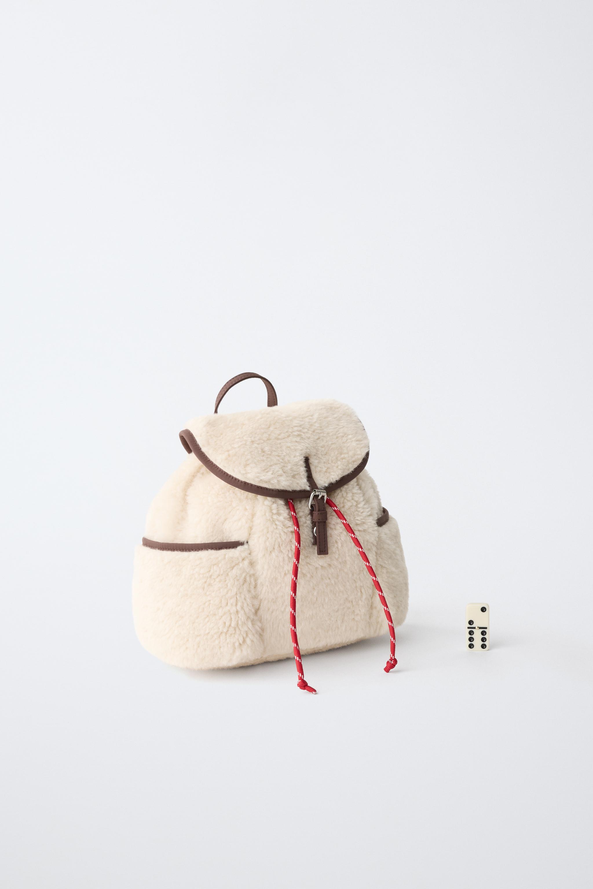 SAC À DOS EN MOUTON SYNTHÉTIQUE