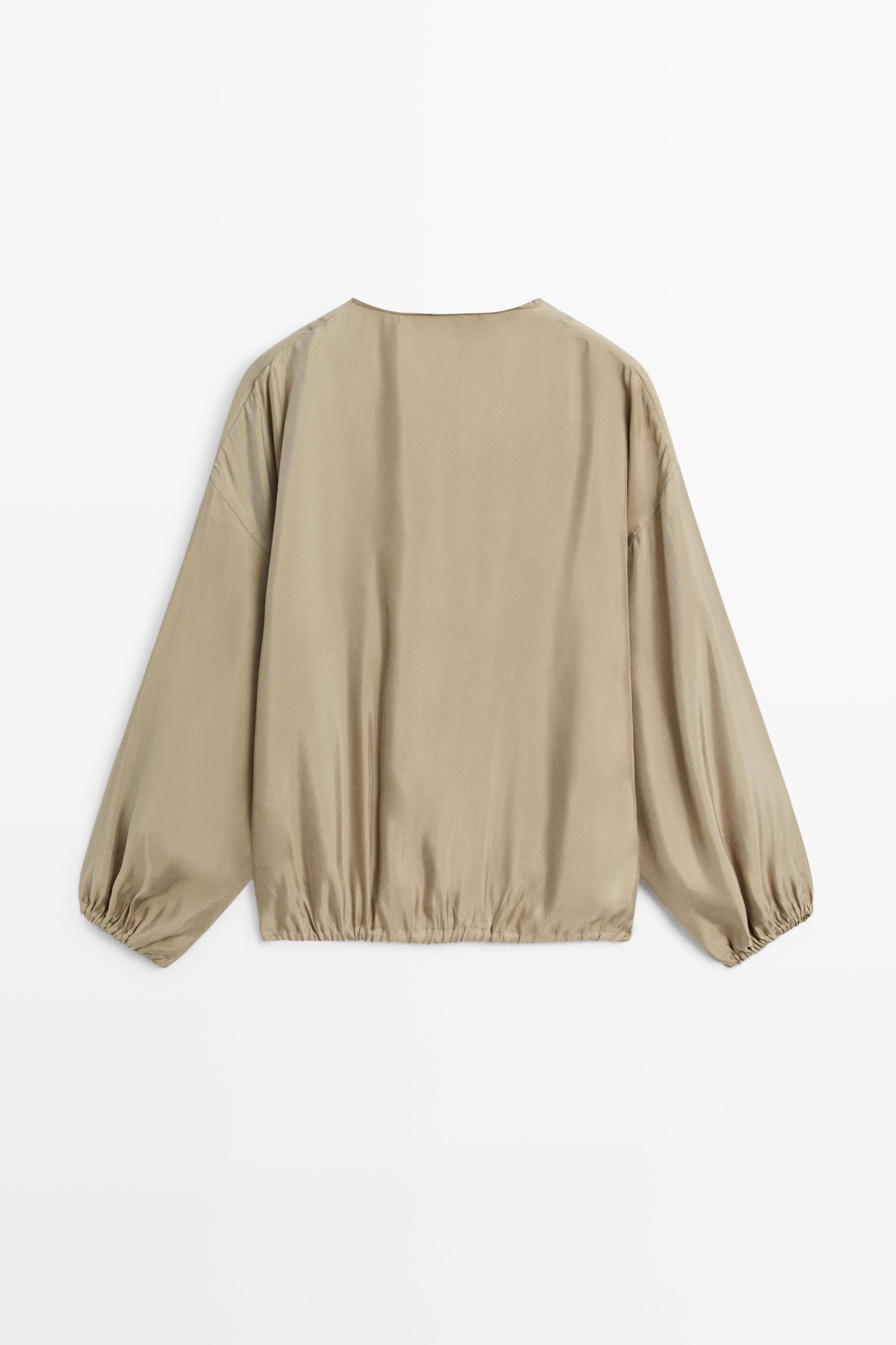 Blouse fluide à cordon au col