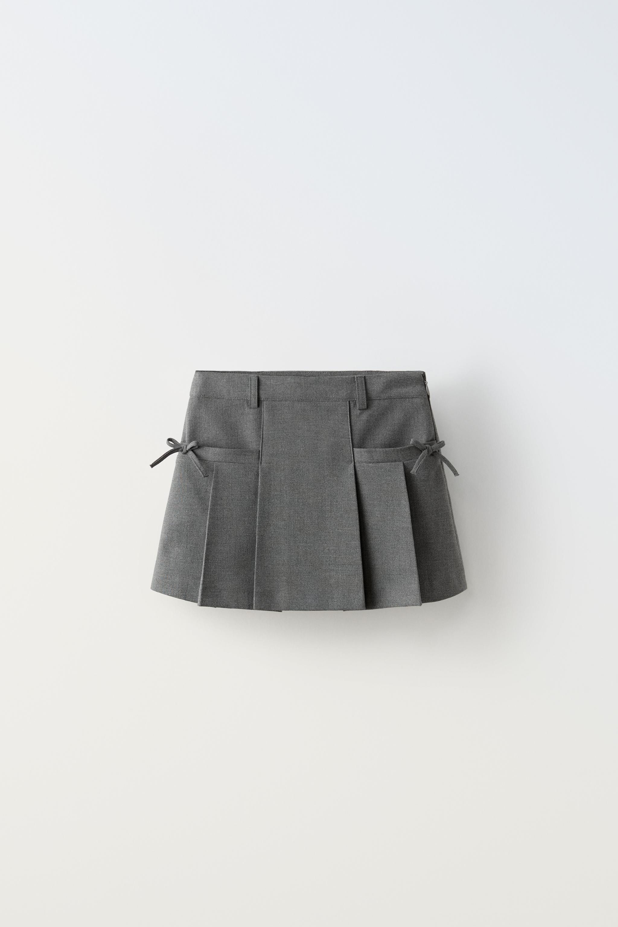 BOX PLEAT SKIRT WITH BOWS