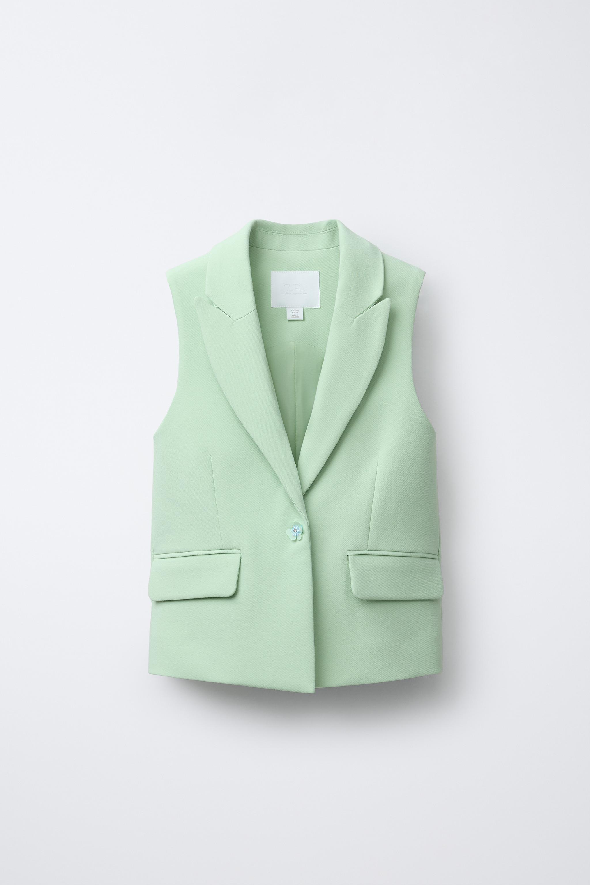 GILET LONG BOUTON BIJOU