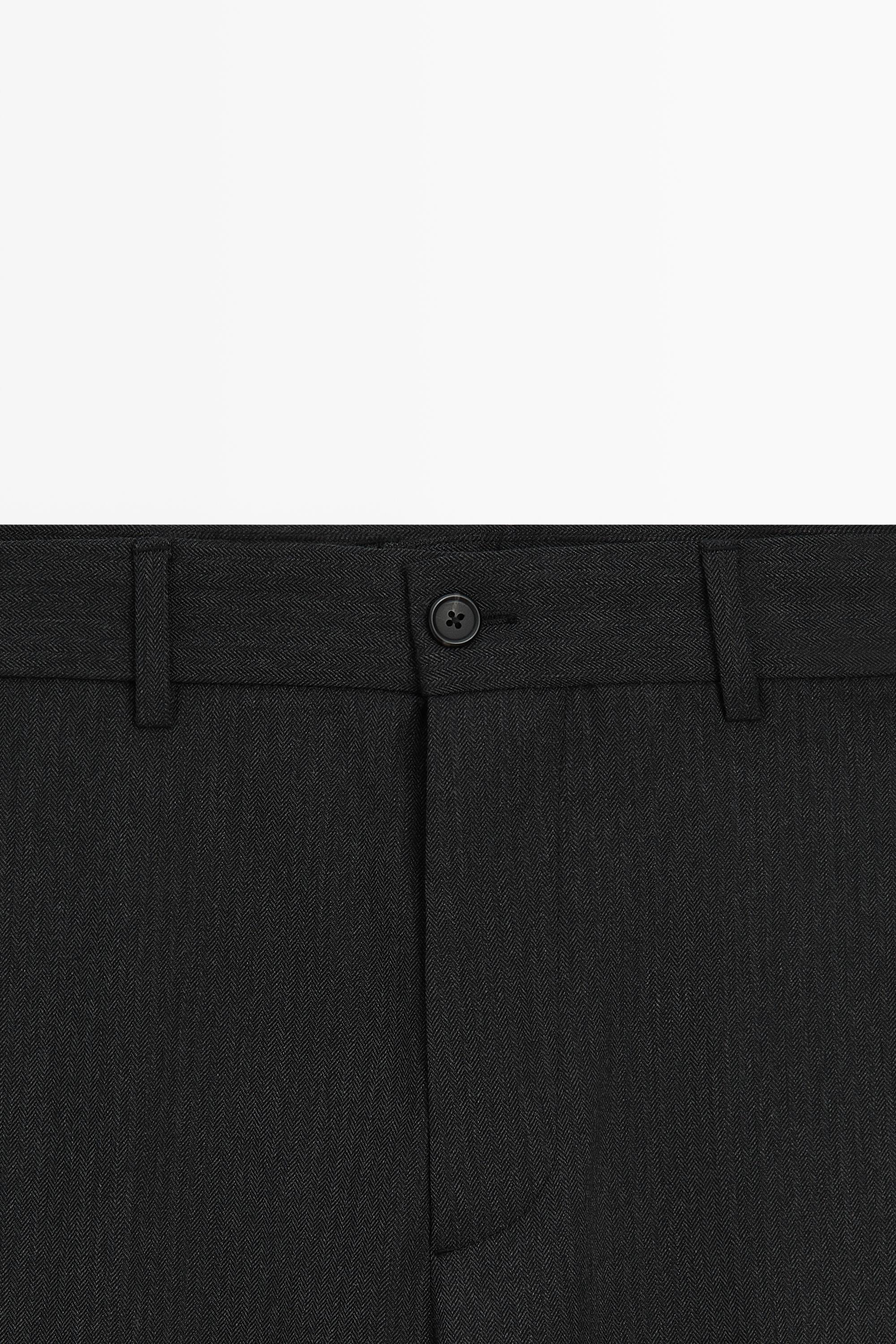Pantalon relaxed fit à chevrons 100 % laine