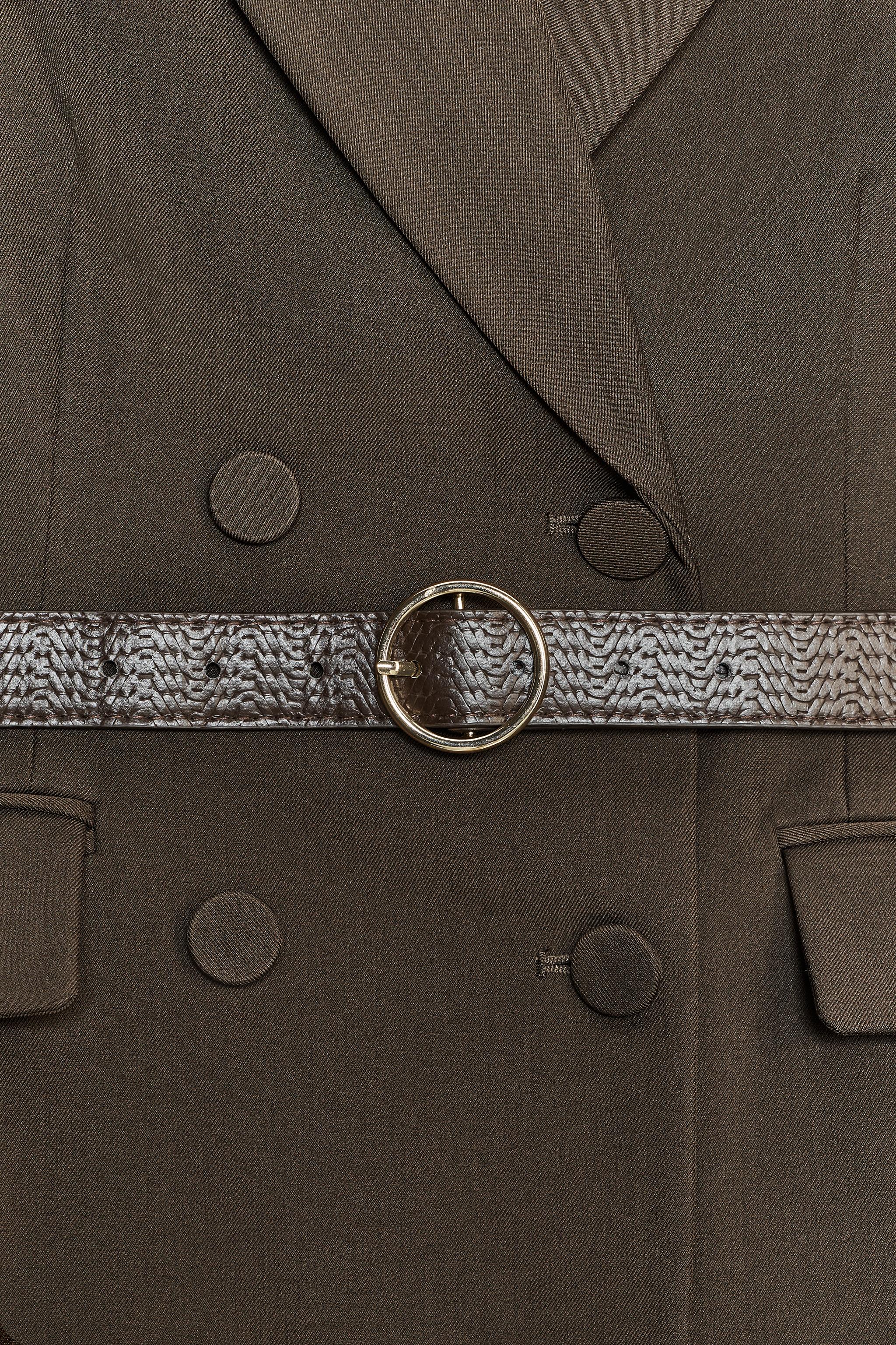 BELTED VEST