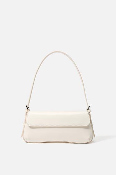 PERPETINĖ RANKINĖ SU ATVARU – white – „Zara“