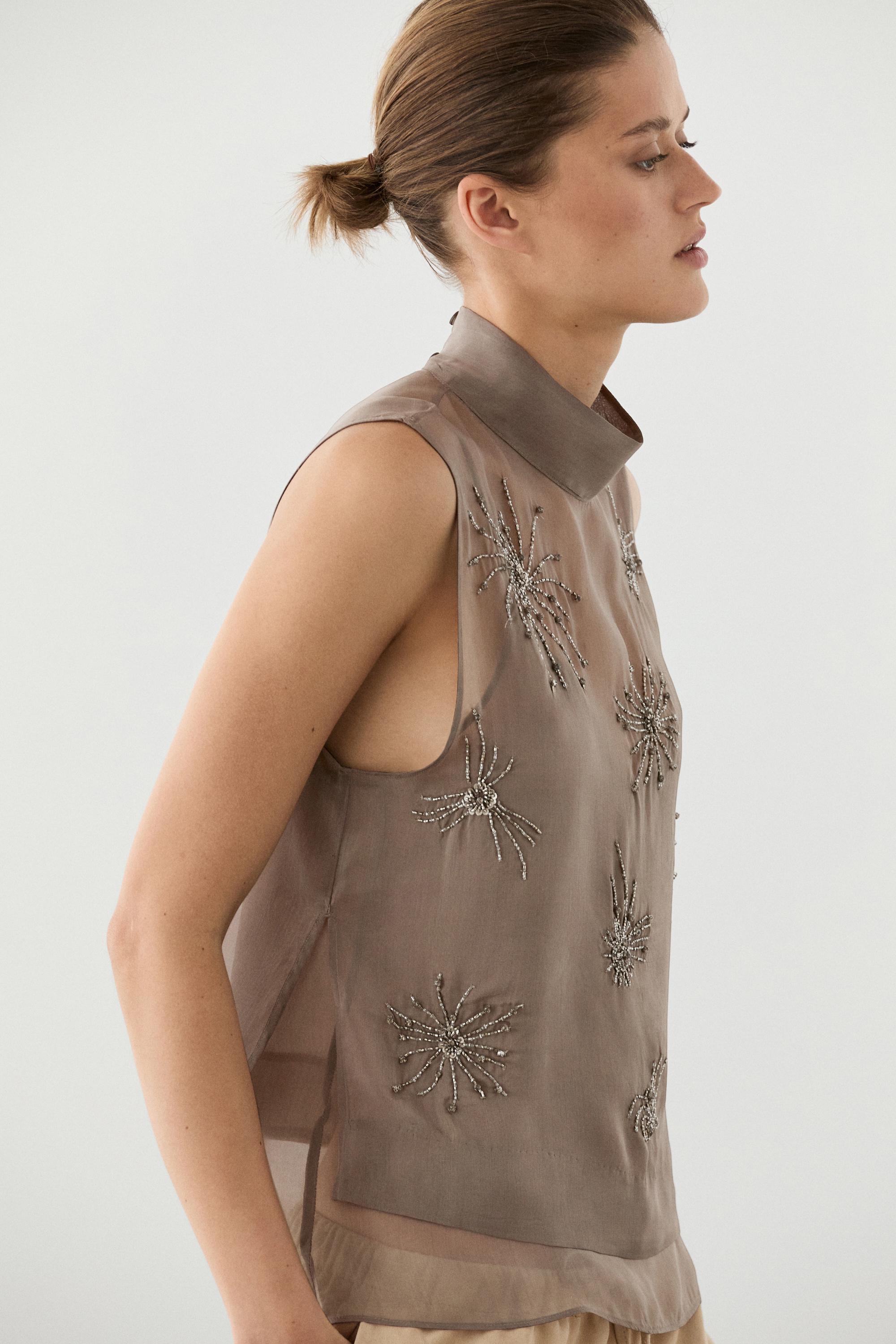 Semi-sheer top with embroidered detail
