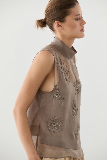 Top semitransparente detalle bordados - Chocolate de Zara