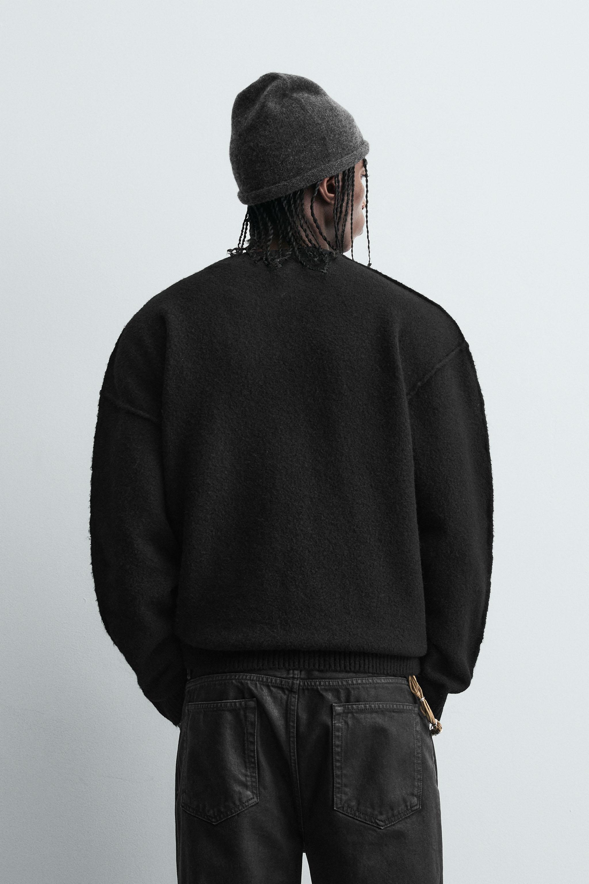 TEXTURED SWEATER WITH REVERSE EFFECT SEAMS