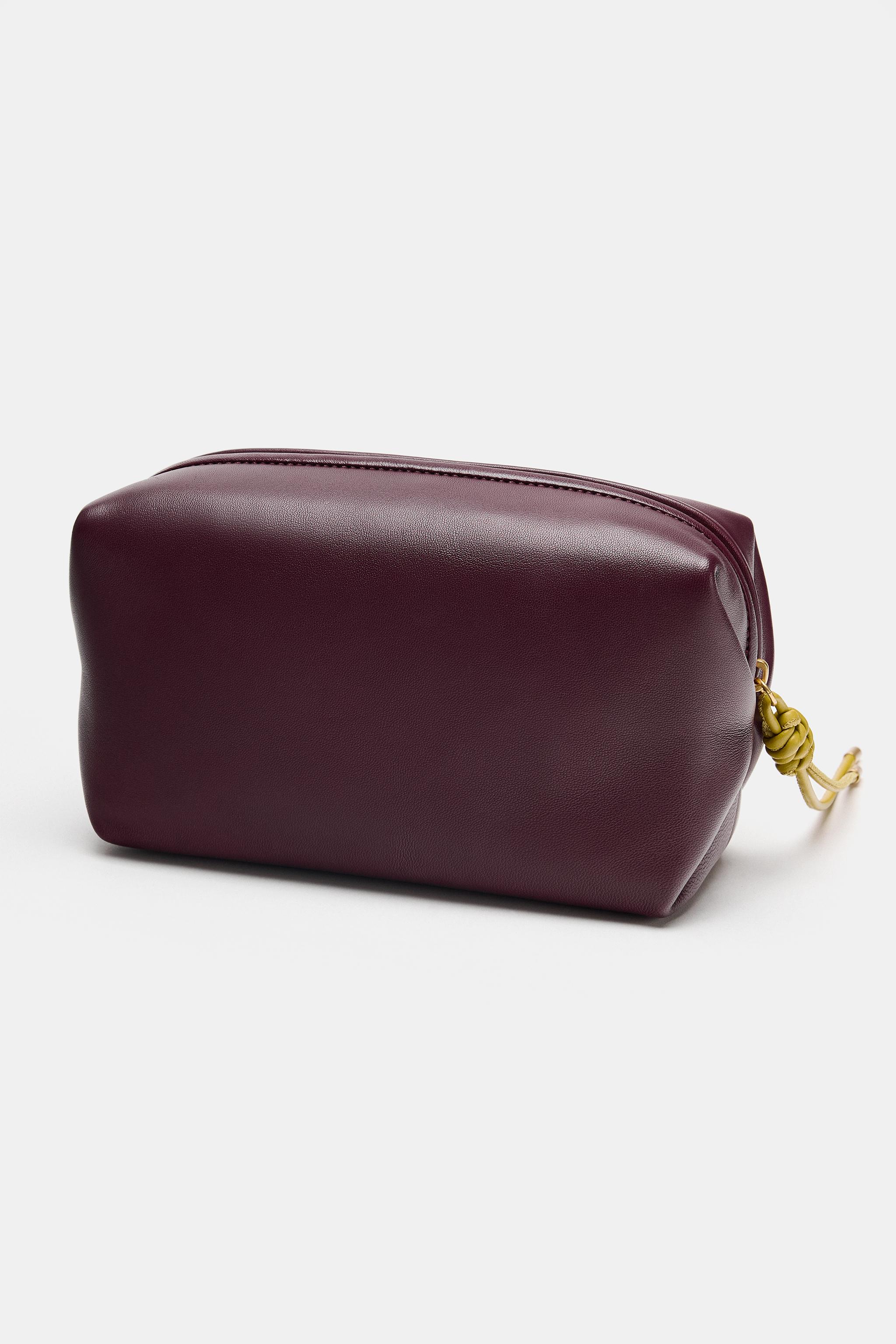 TROUSSE EN CUIR