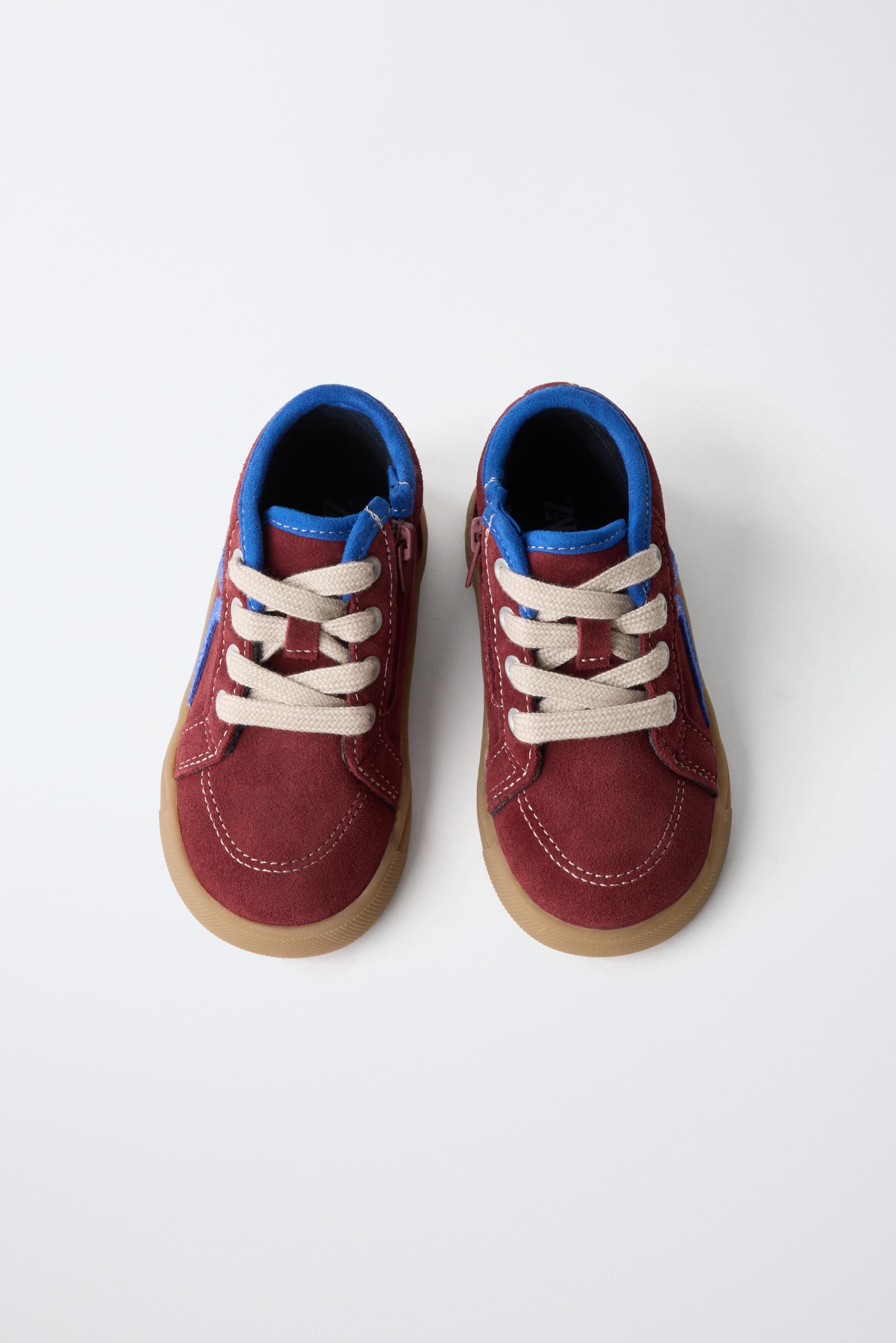 BASKETS MONTANTES EN CUIR