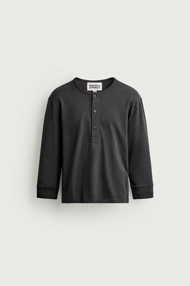 BLUZË CROPPED FIT JAKË ME KOPSA - E zezë nga Zara
