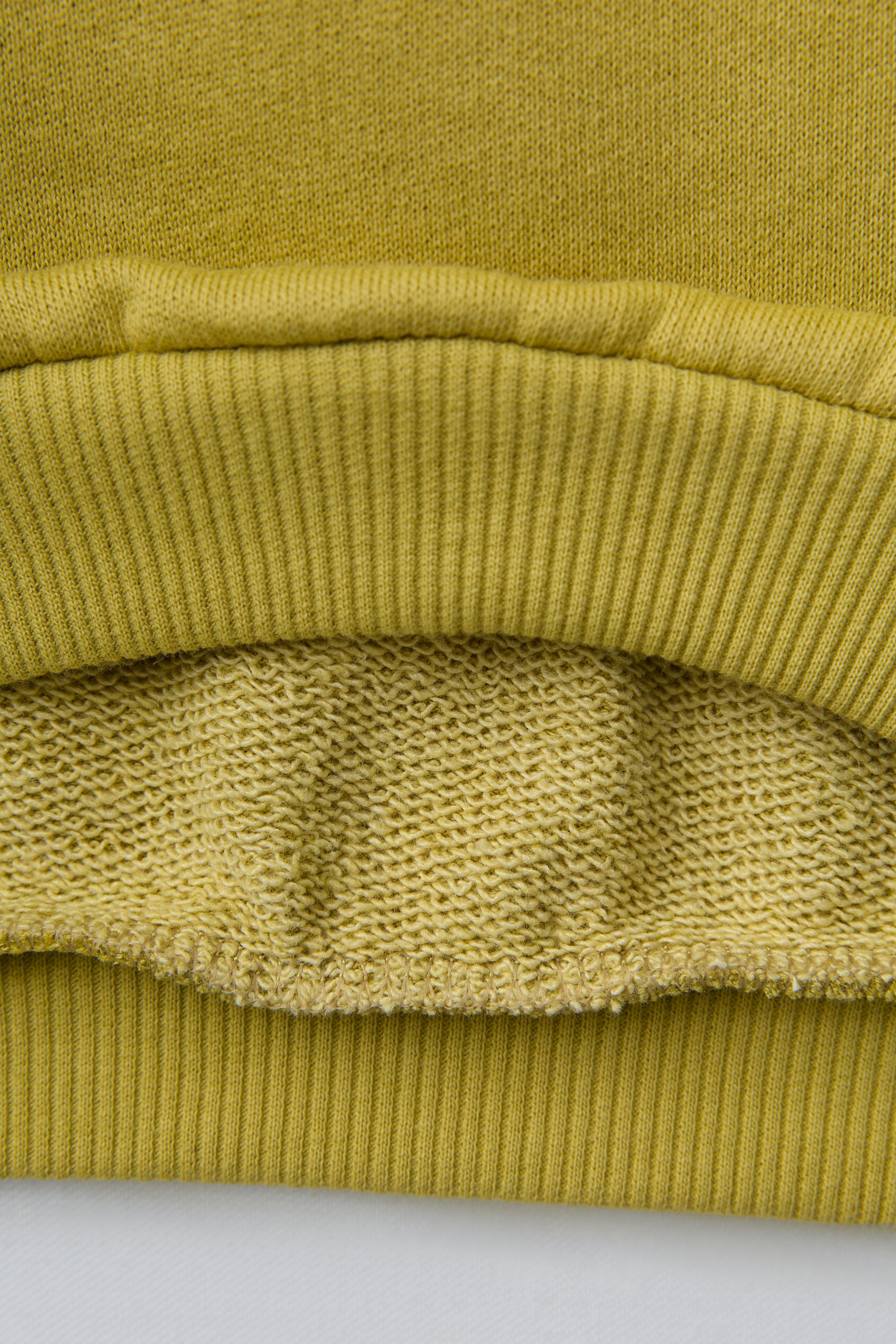 SWEAT À INSCRIPTION BRODÉE