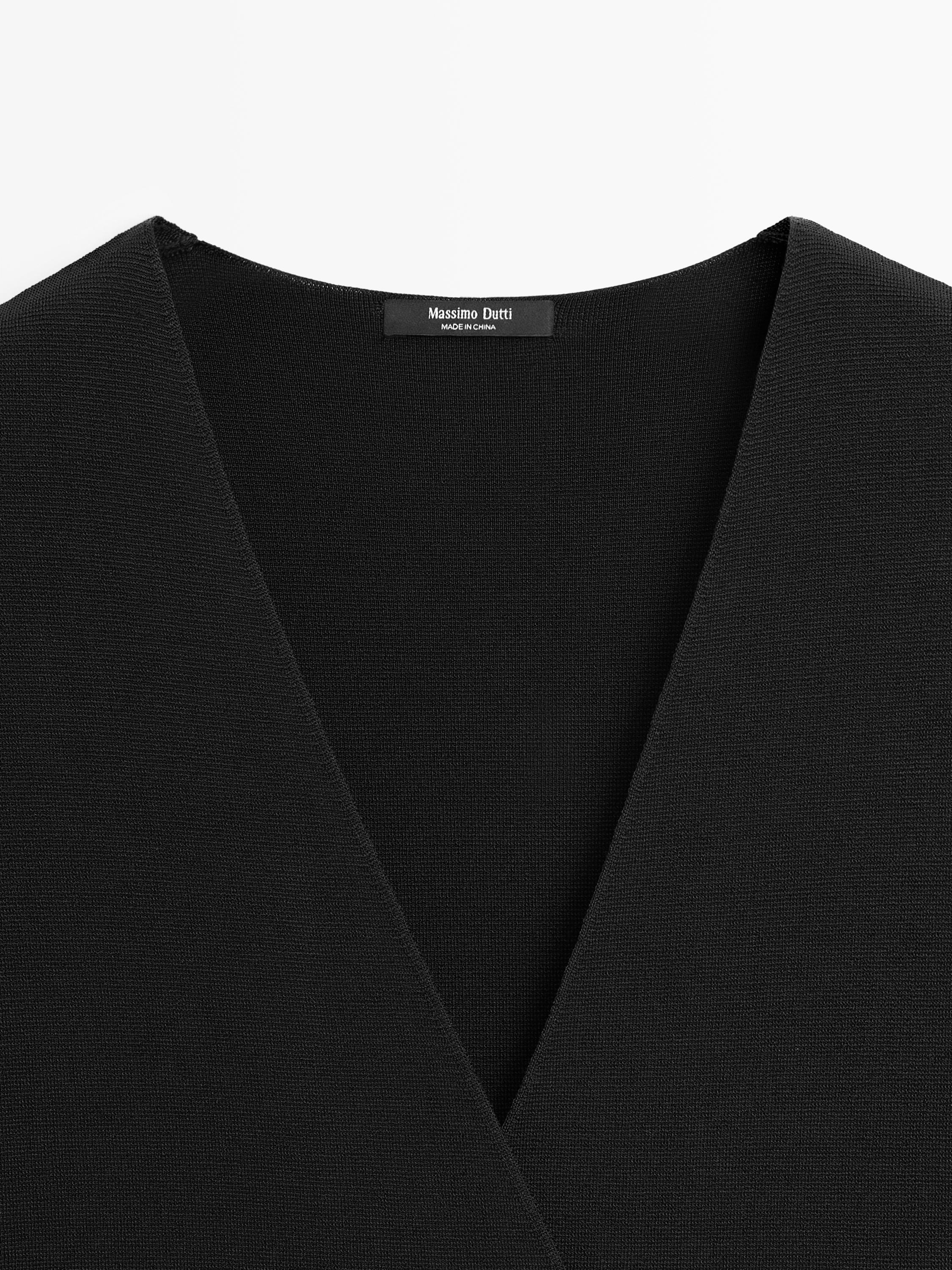 Long double-breasted vest