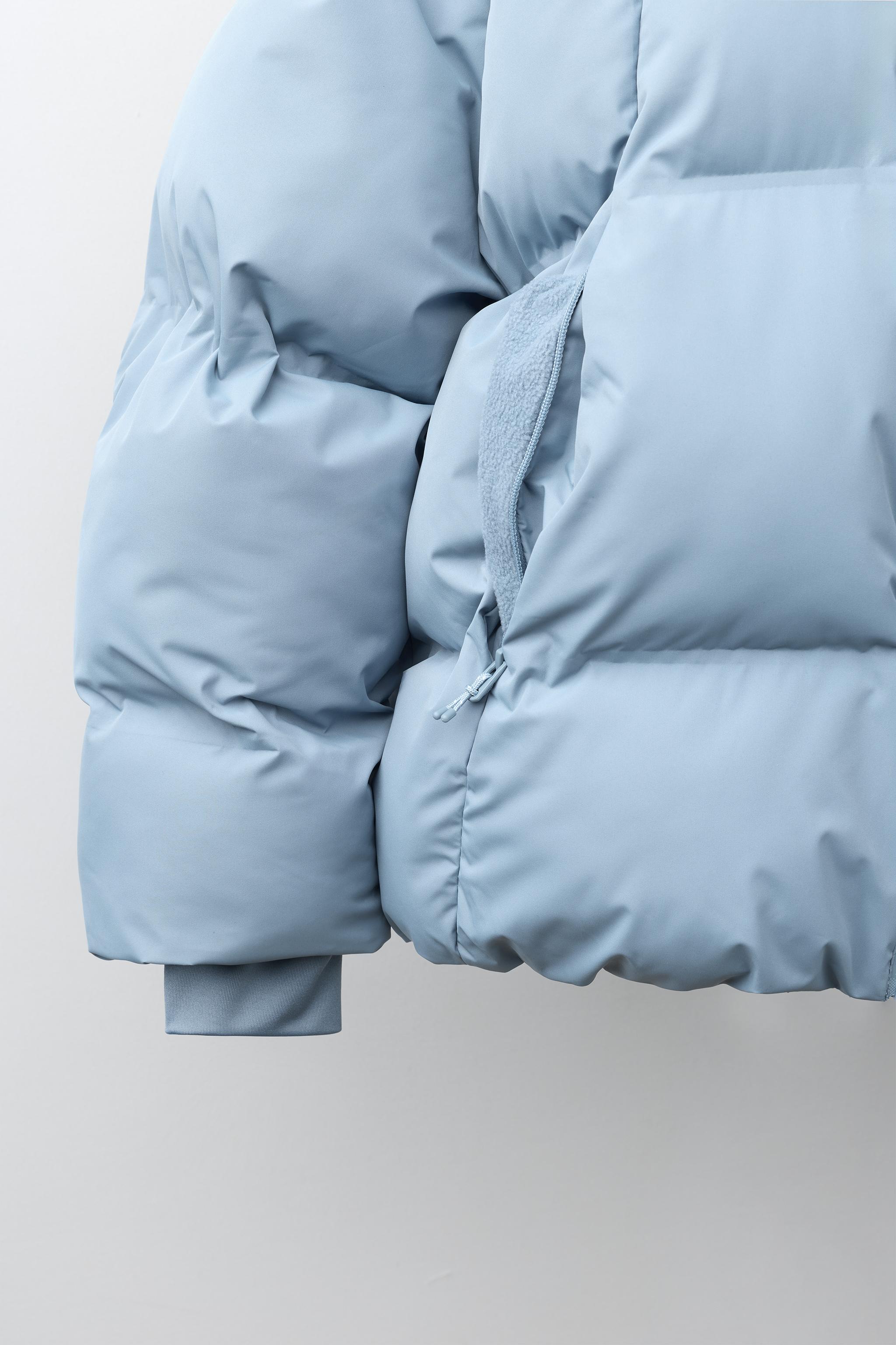 BLOUSON REMBOURRÉ À CAPUCHE DÉPERLANT