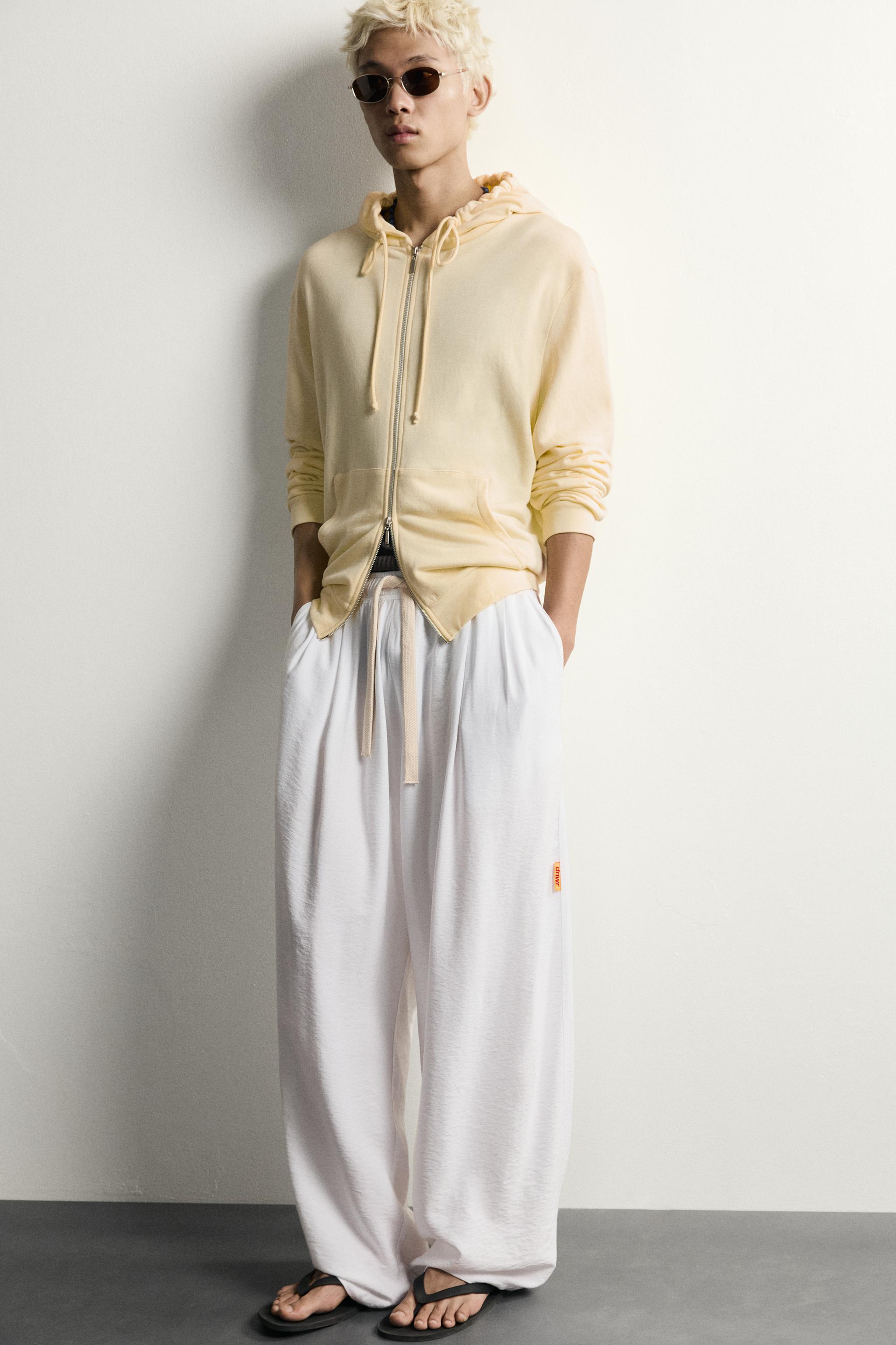 RELAXED FIT FLOWY PANTS