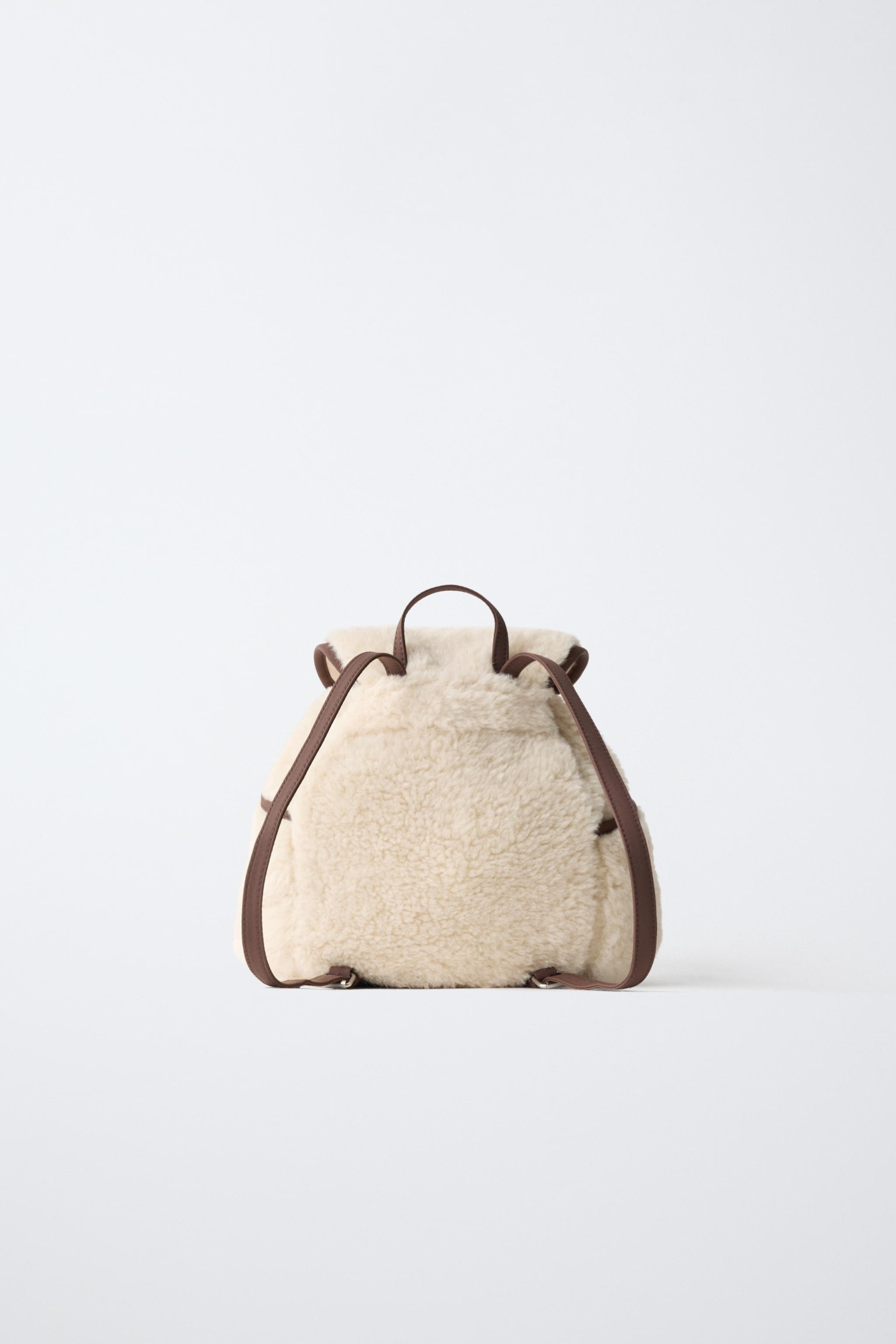 SAC À DOS EN MOUTON SYNTHÉTIQUE