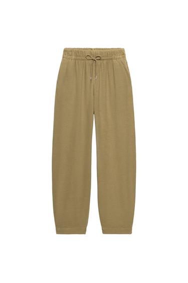 WASHED EFFECT TROUSERS - Olive green by Zara