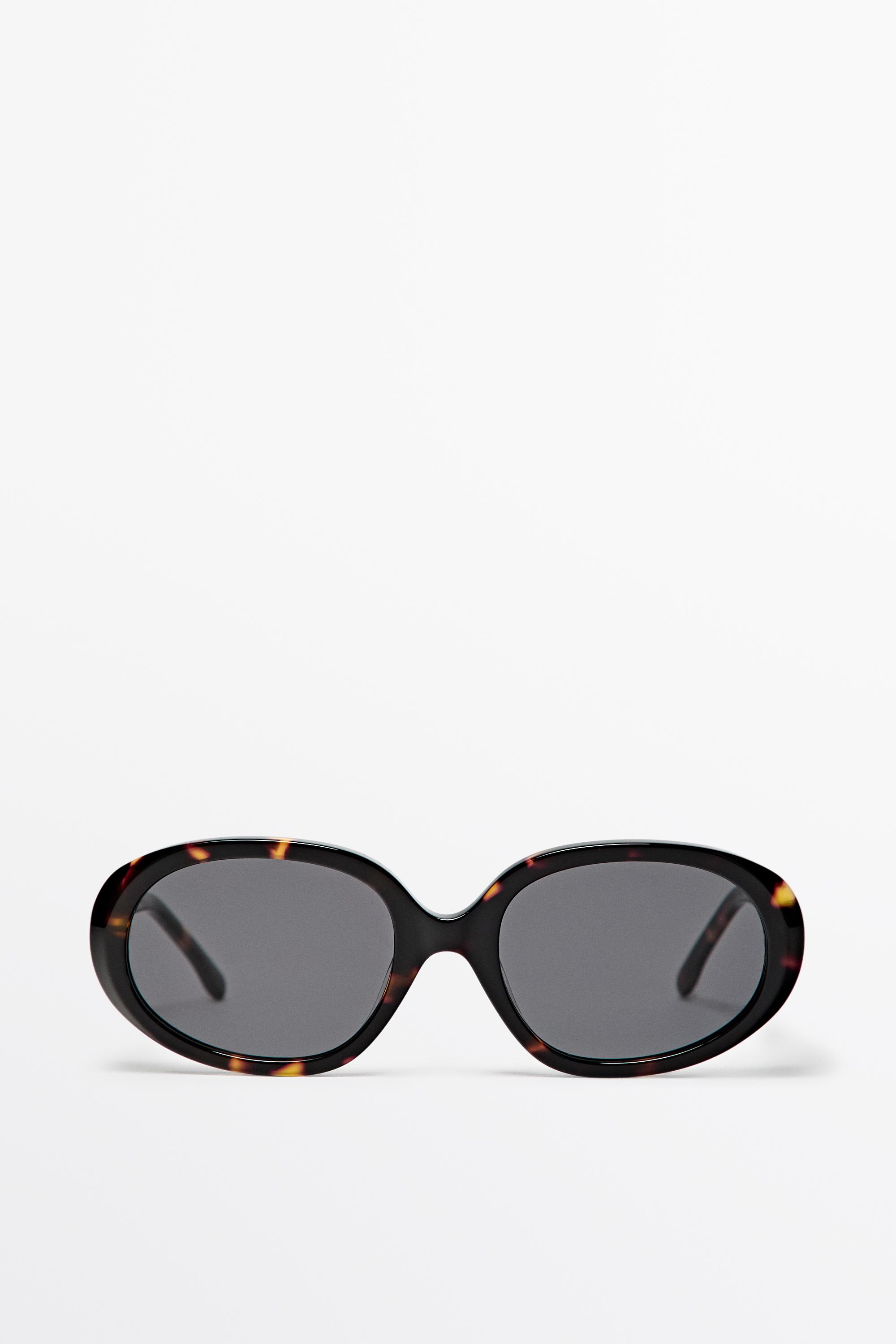 Oval tortoiseshell-effect sunglasses — Brown