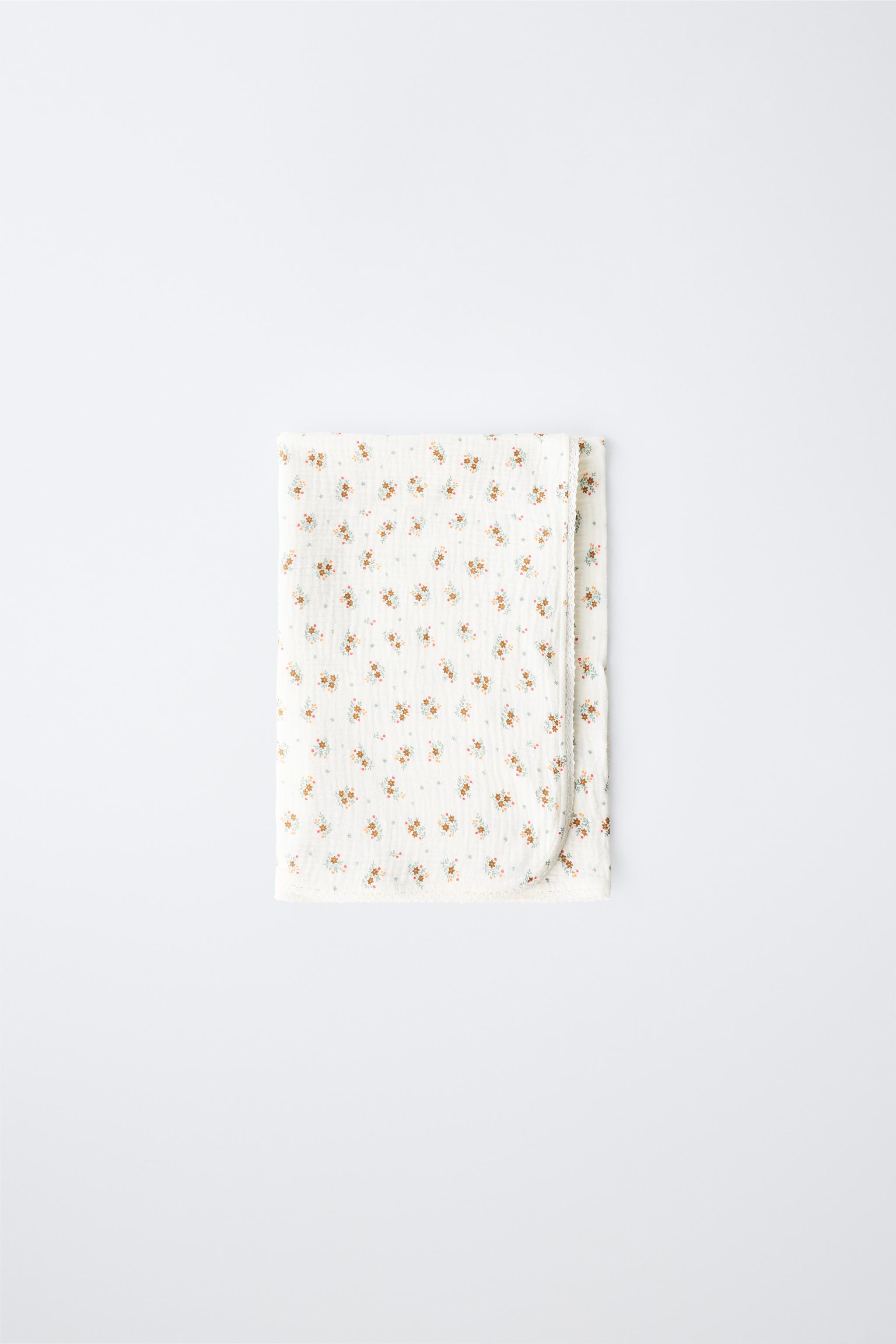 FLORAL PRINT TEXTURED LACE BLANKET — Ecru