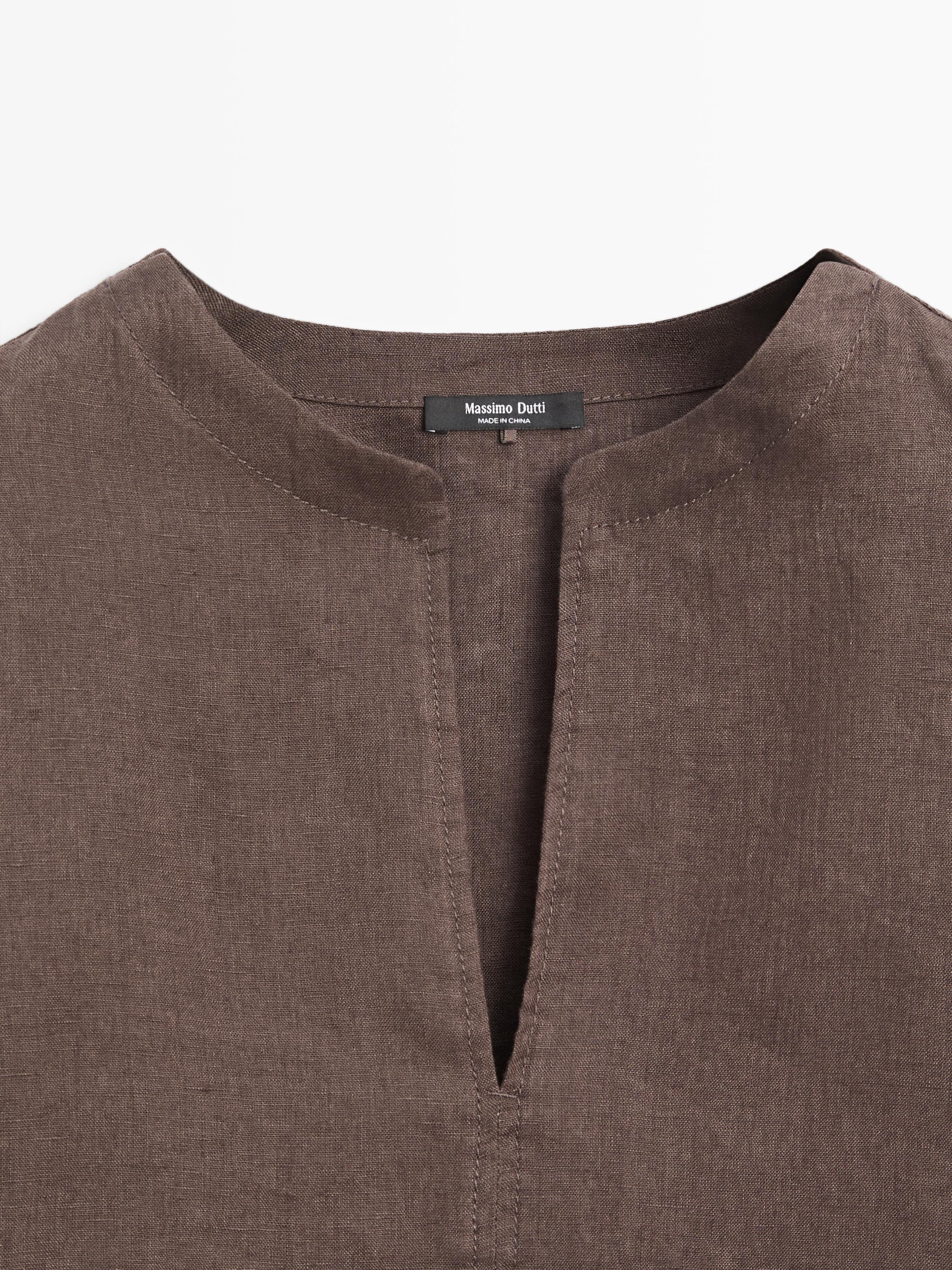 100% linen blouse with topstitching detail