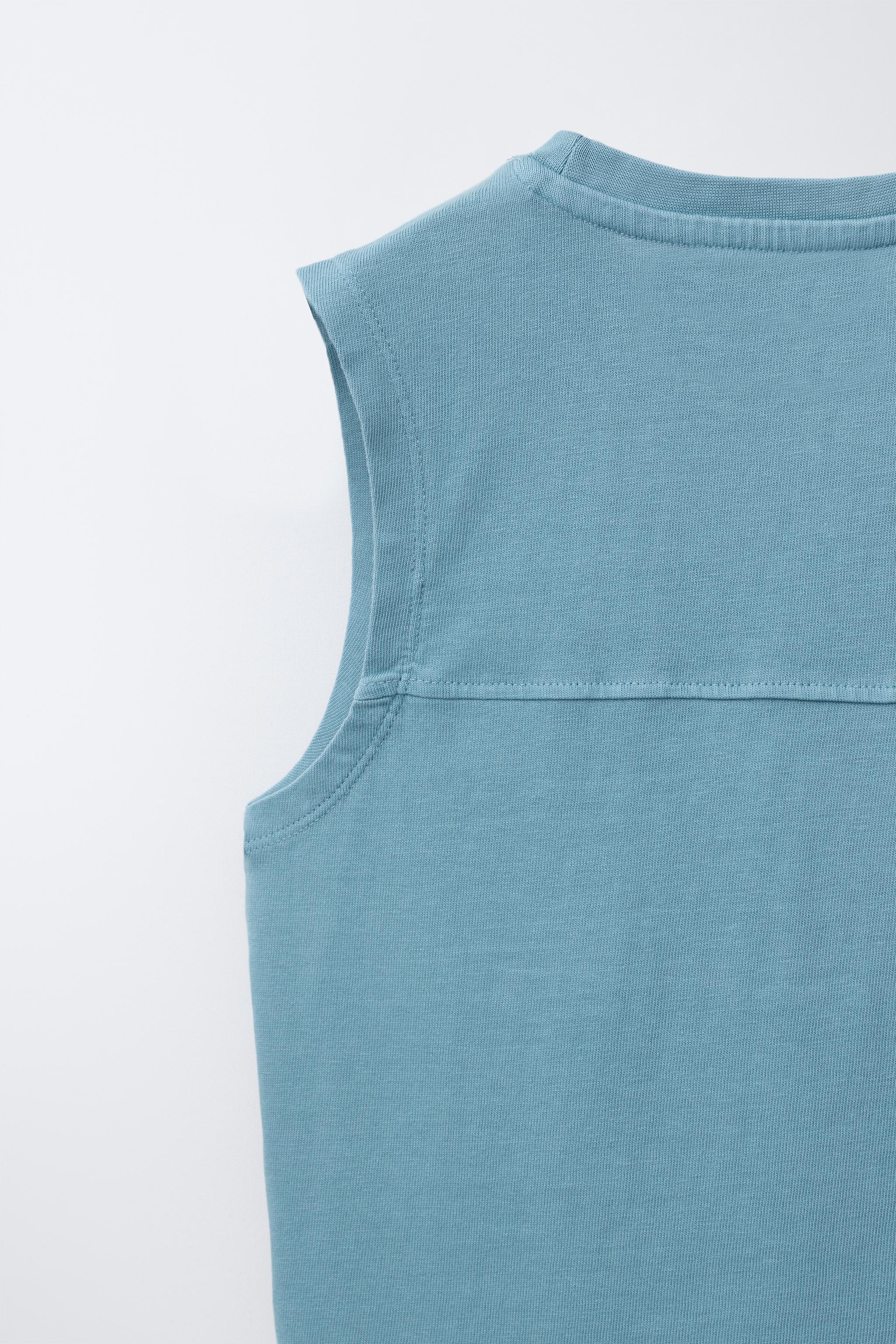 T-SHIRT SANS MANCHES UNI