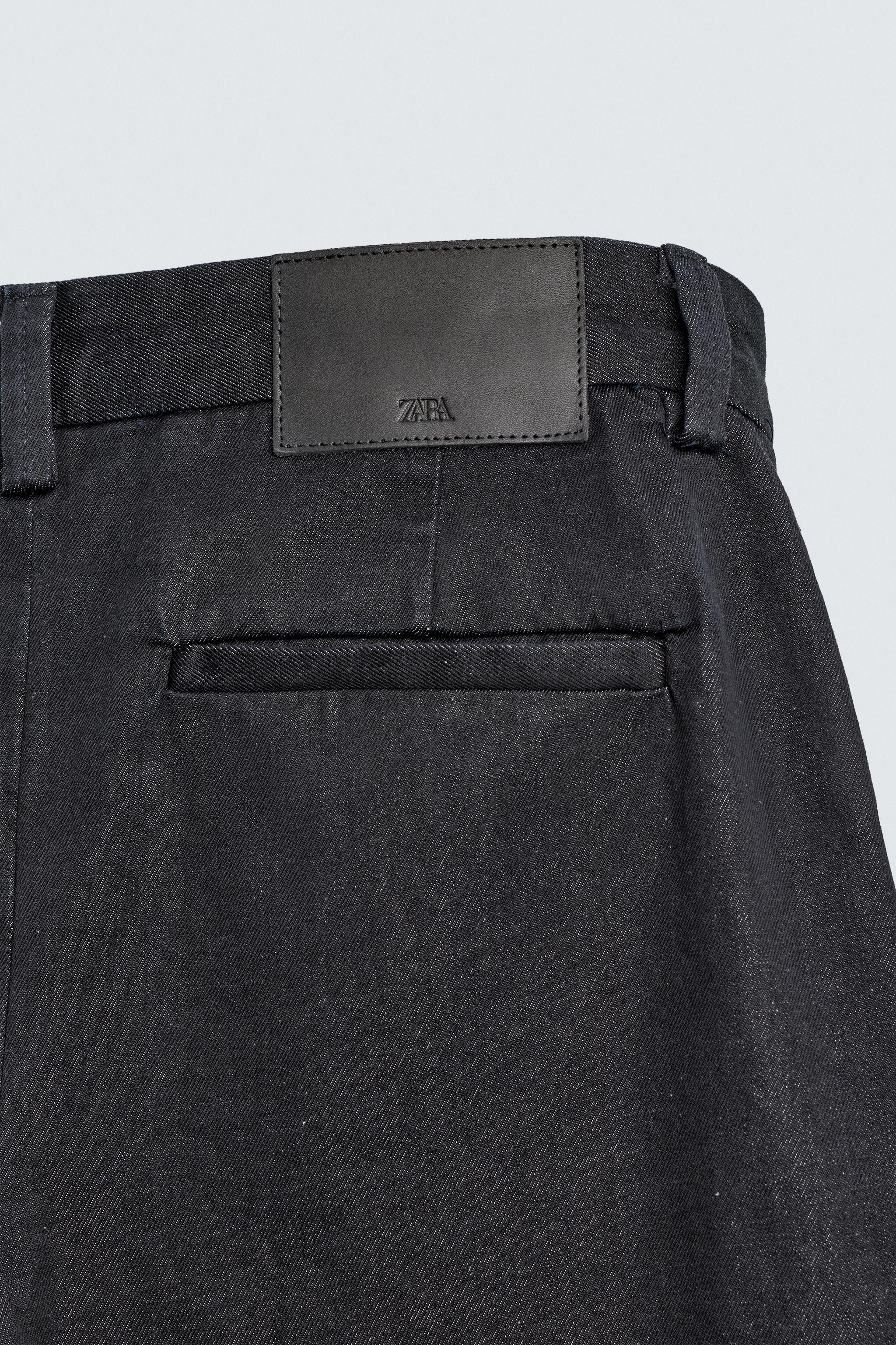 PANTALON CHINO EN DENIM À PLIS