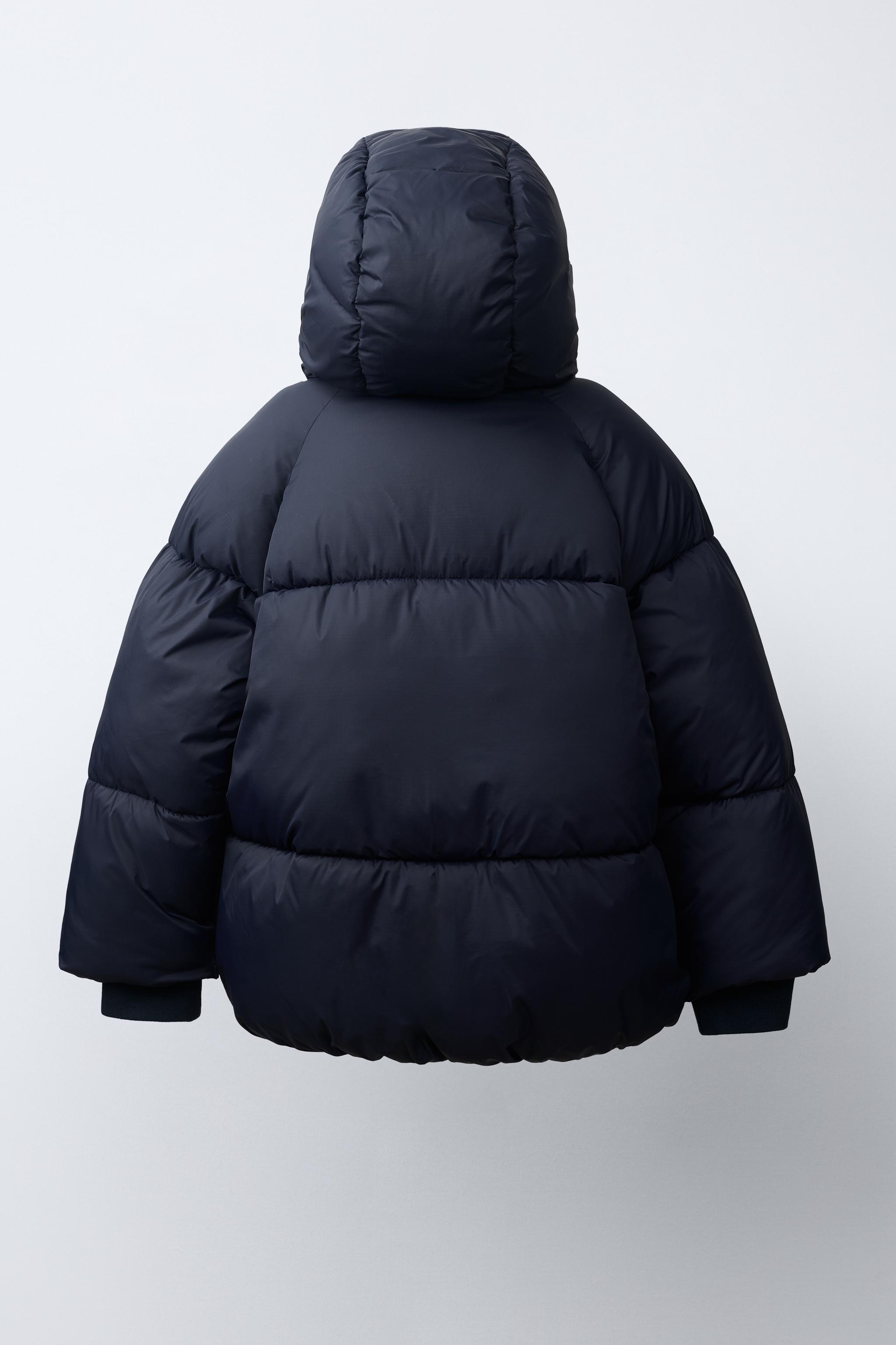 MANTEAU MATELASSÉ À CAPUCHE DÉPERLANT