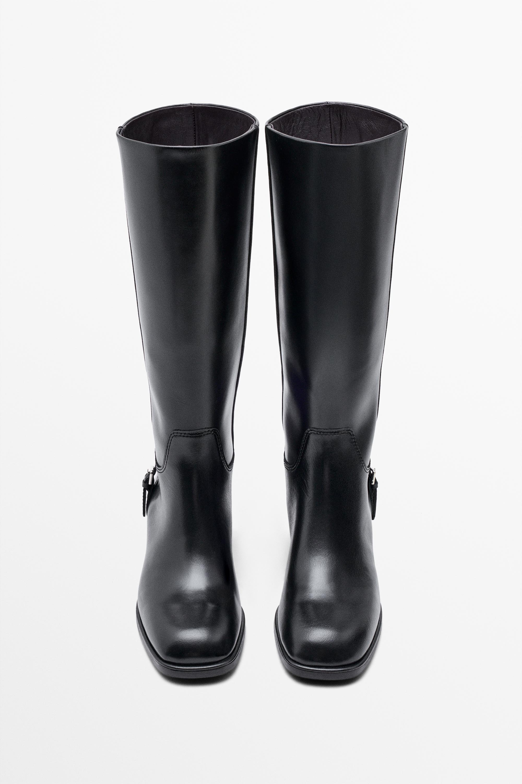 Bottes plates en cuir à boucle latérale