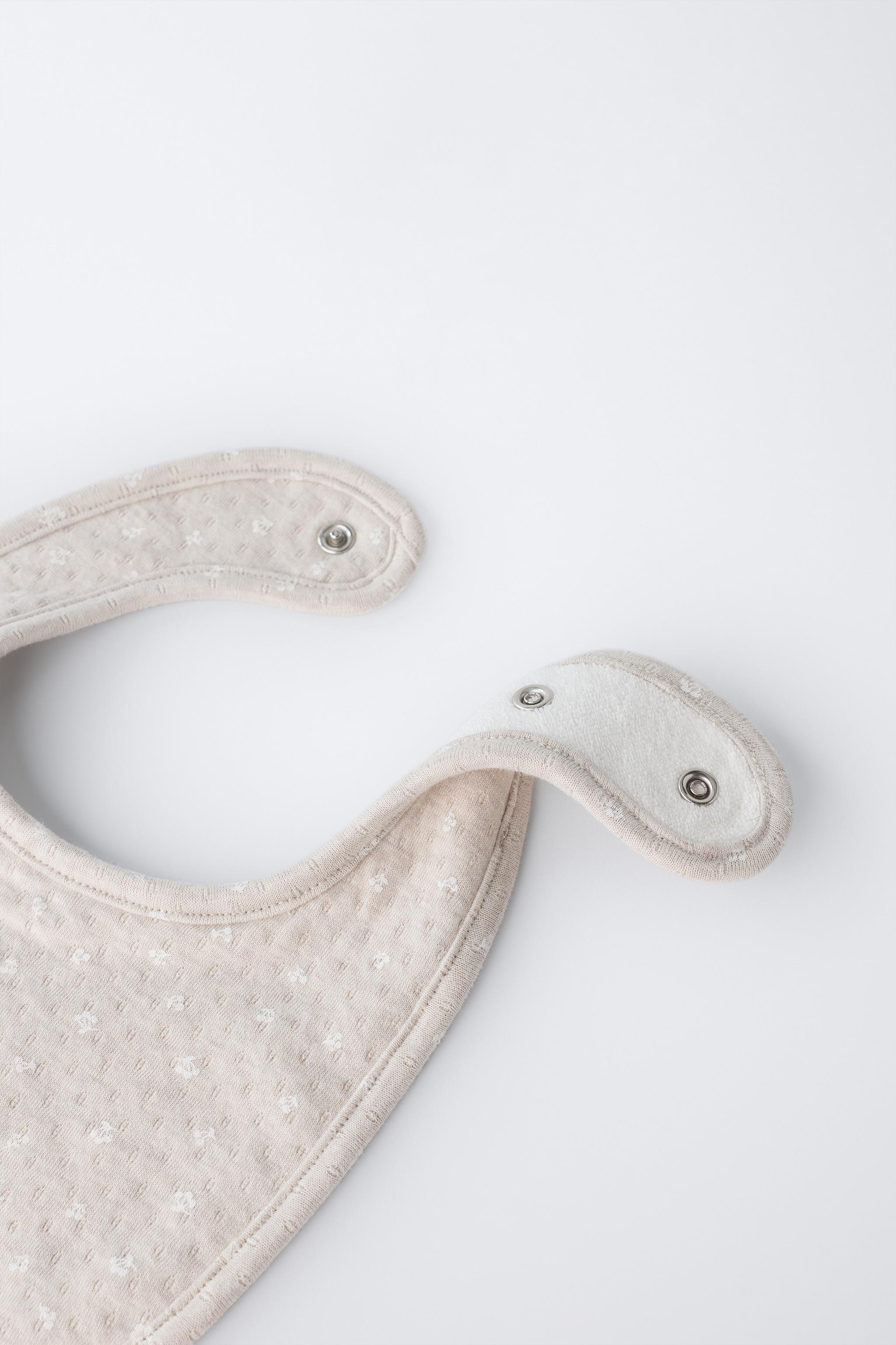 TWO-PIECE PRINTED TEXTURED HAT AND BIB SET