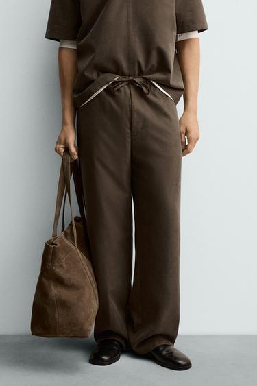 PANTALÓN FLUIDO WIDE FIT - Khaki de Zara