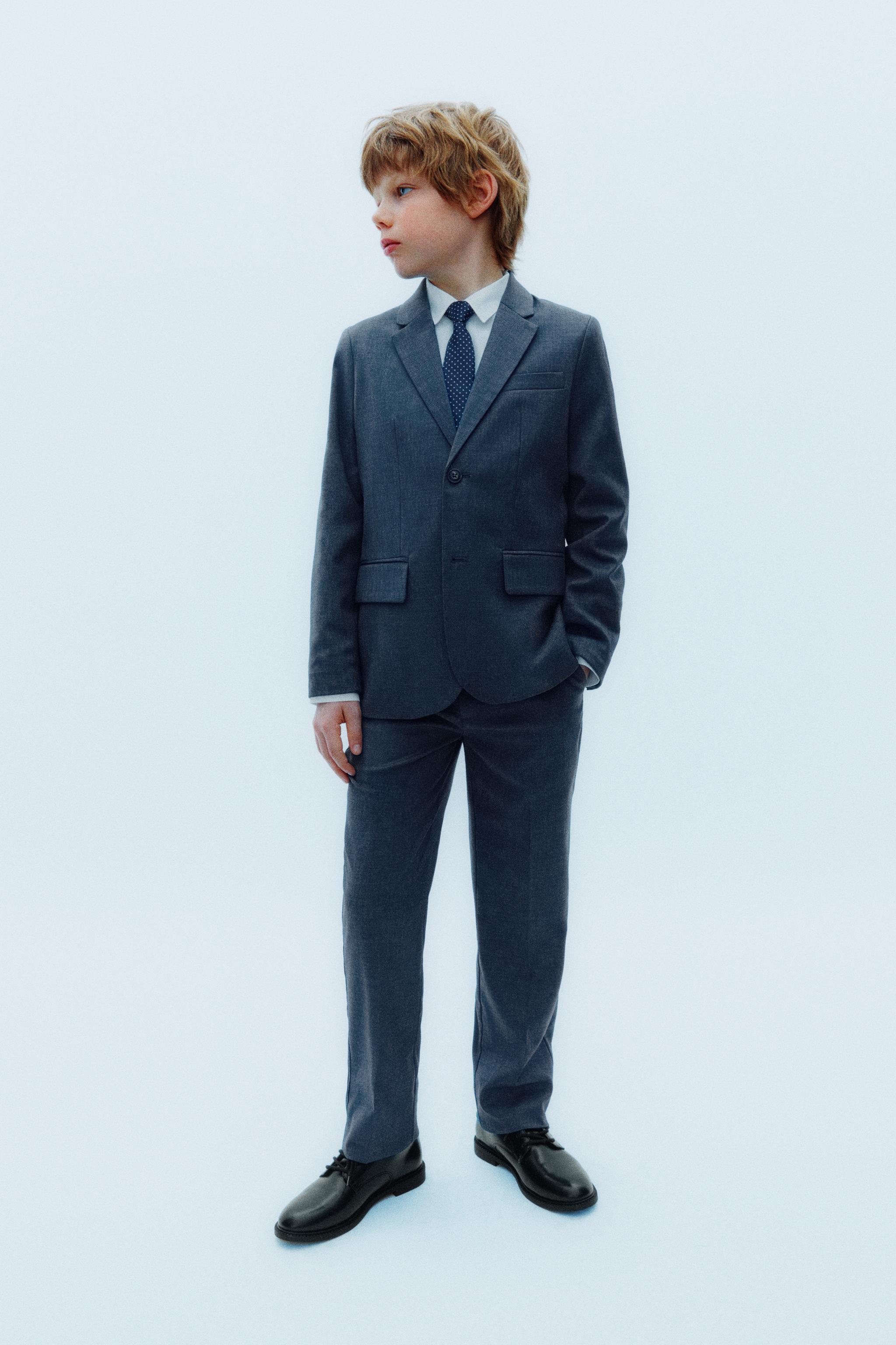 TEXTURED SUIT PANTS