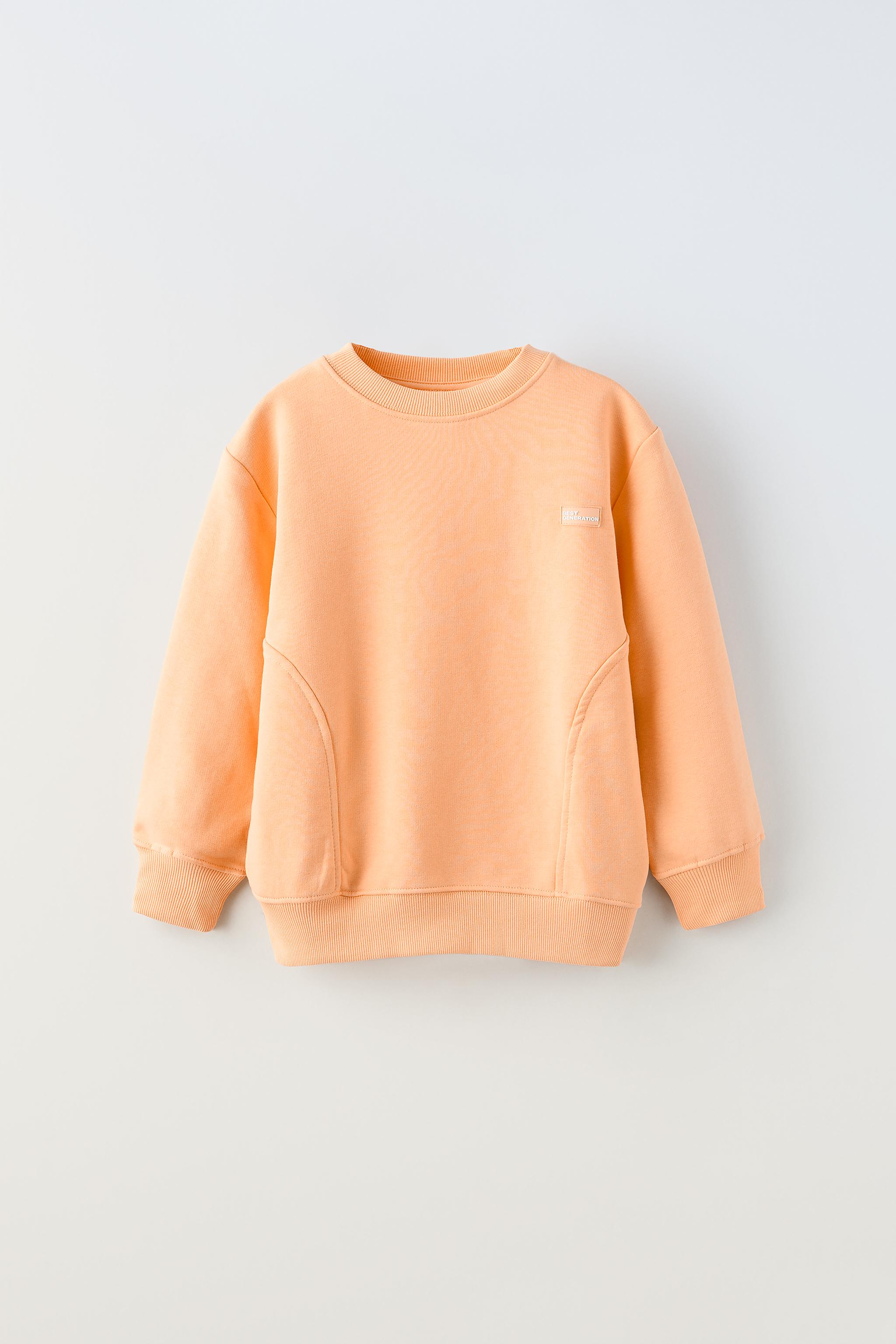 Light best sale orange sweatshirt