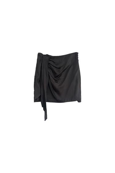 FALDA PANTALÓN MINI CON LAZADA