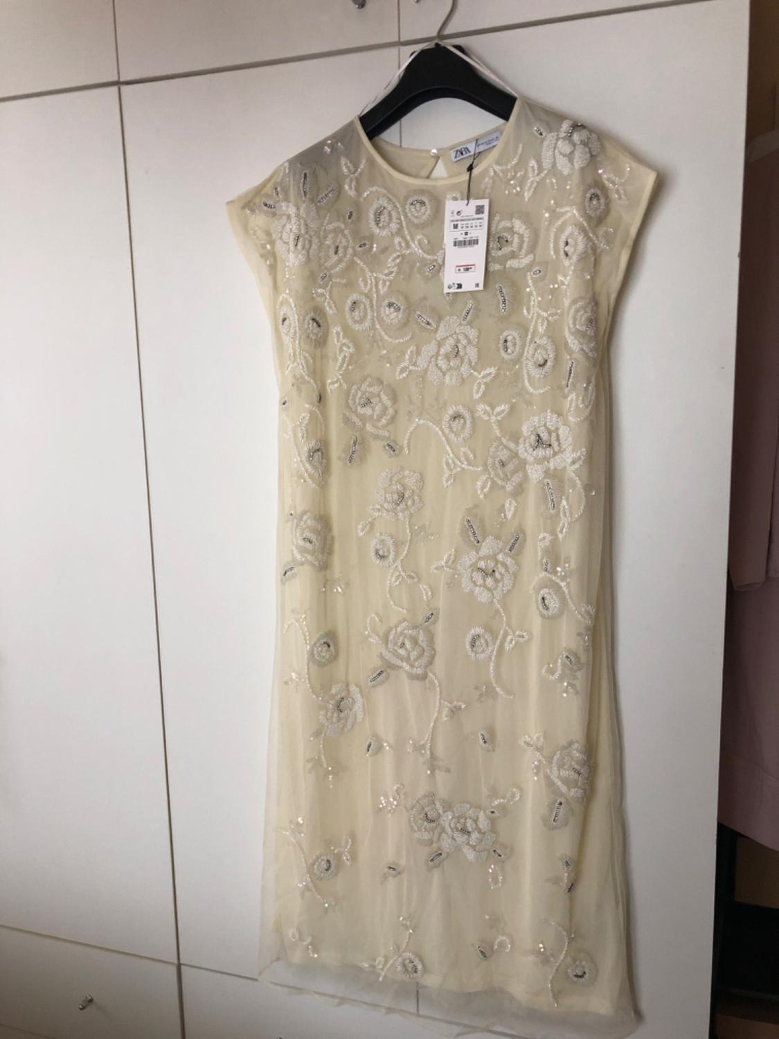 KNIT DRESS WITH BEADING - LIMITED EDITION