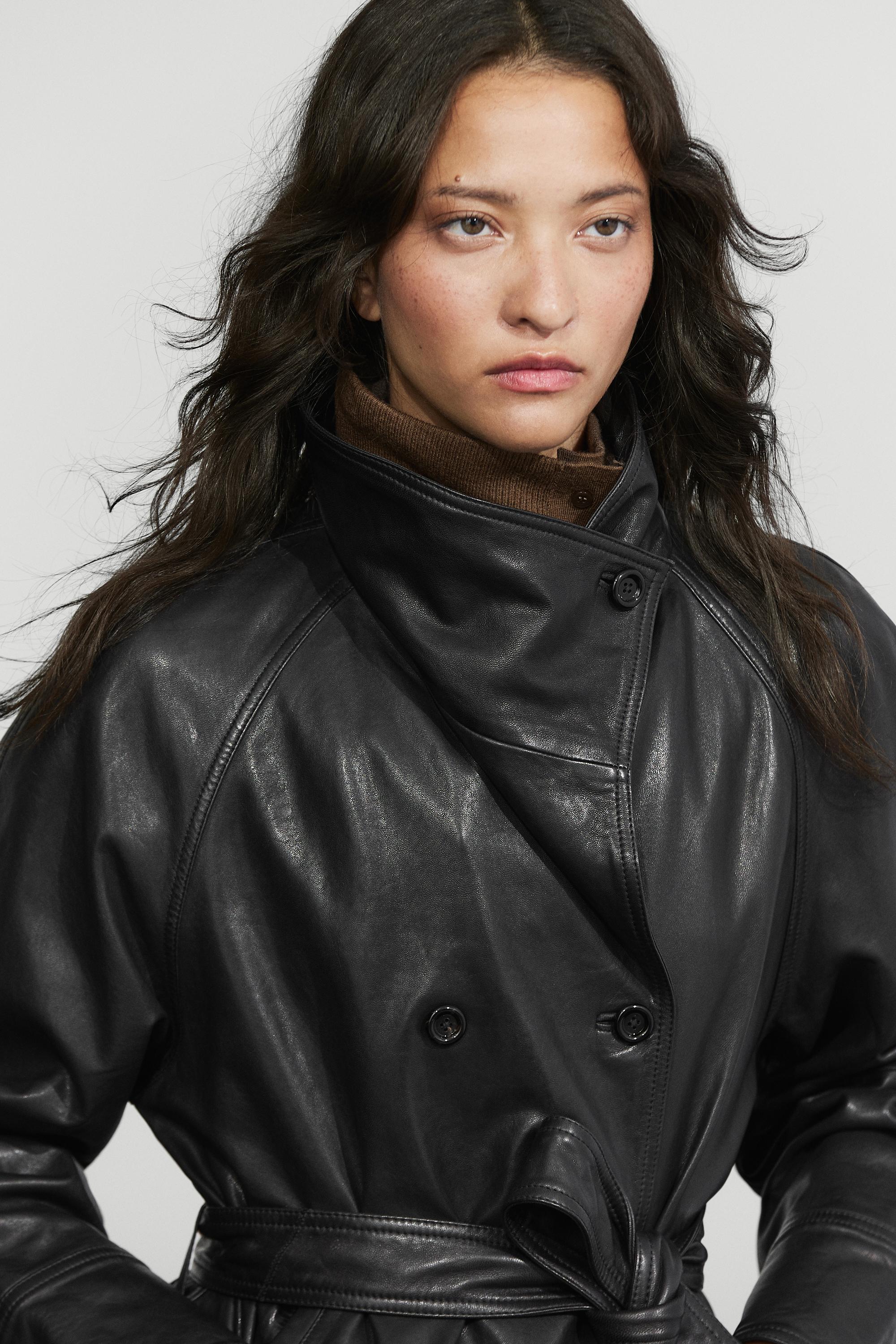 Short leather jacket with belt