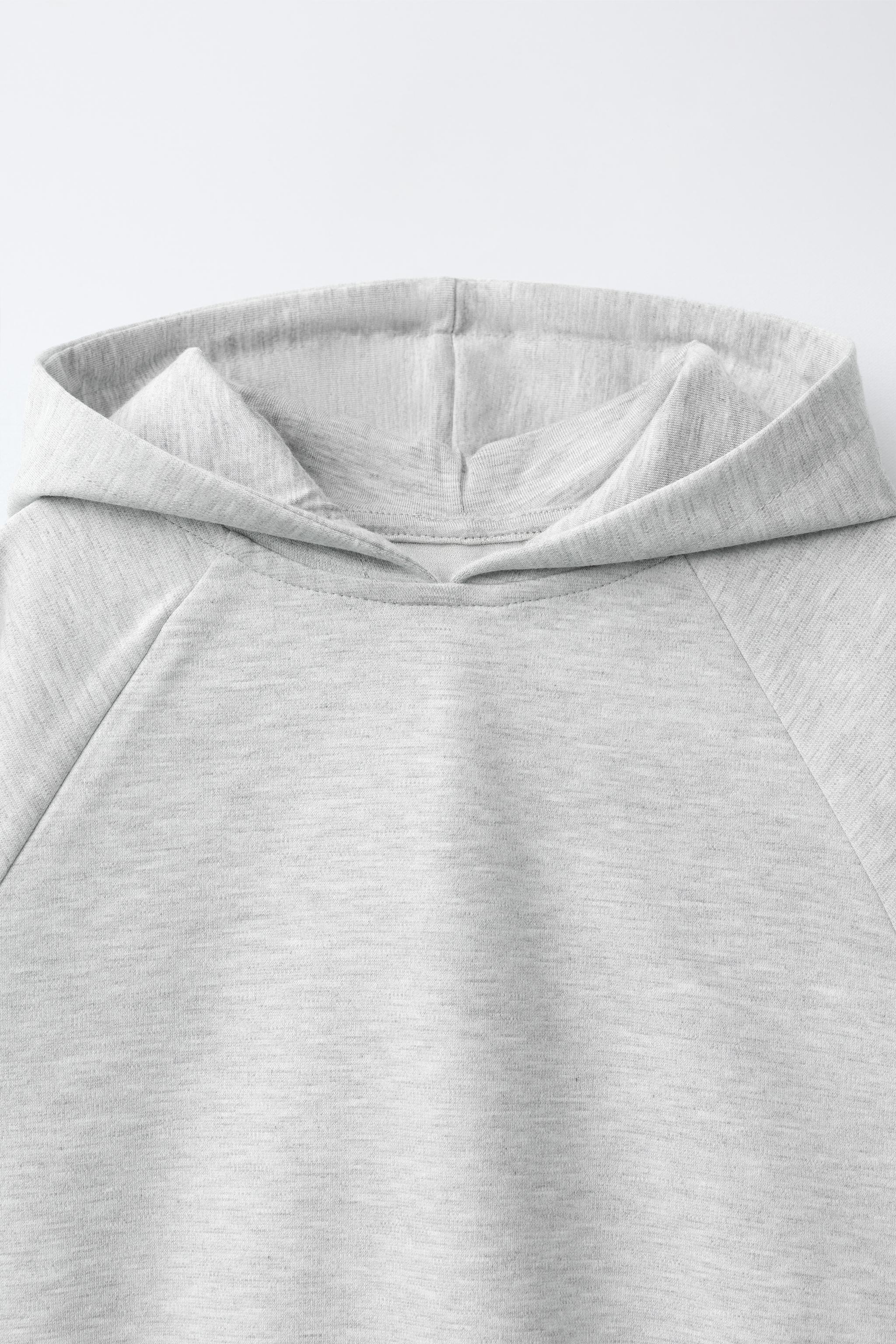 SWEAT À CAPUCHE INTERLOCK UNIE