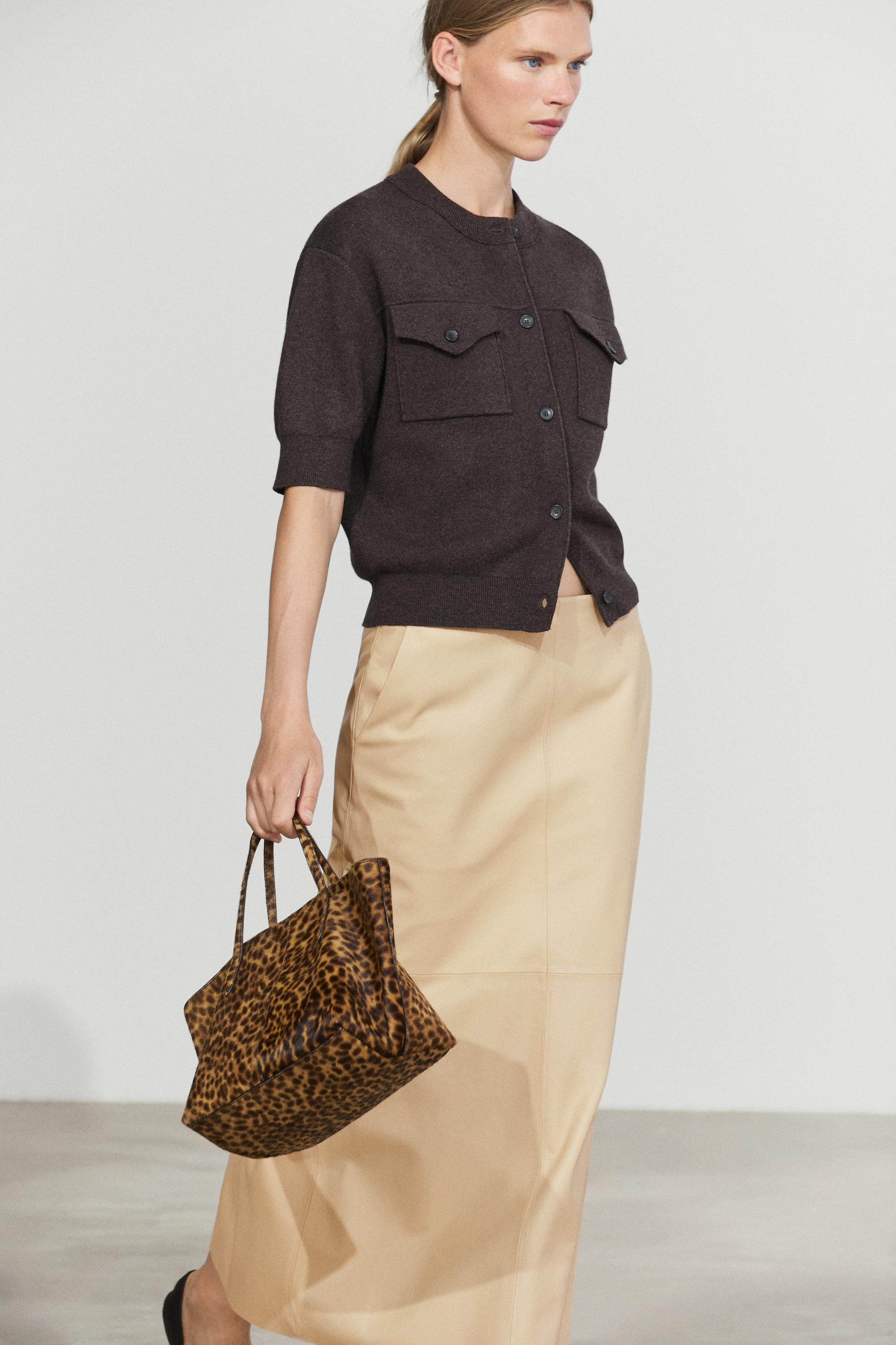 Short sleeve knit cardigan with pockets
