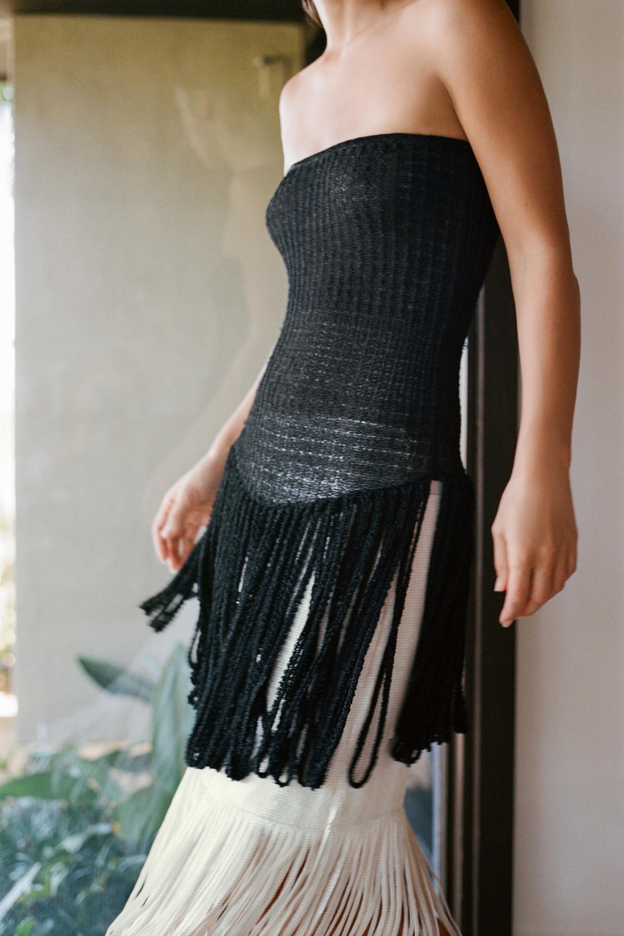 FRINGED STRAIT-ACROSS KNIT TOP
