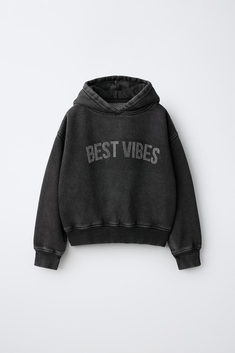 Sudadera capucha efecto lavado aplique strass