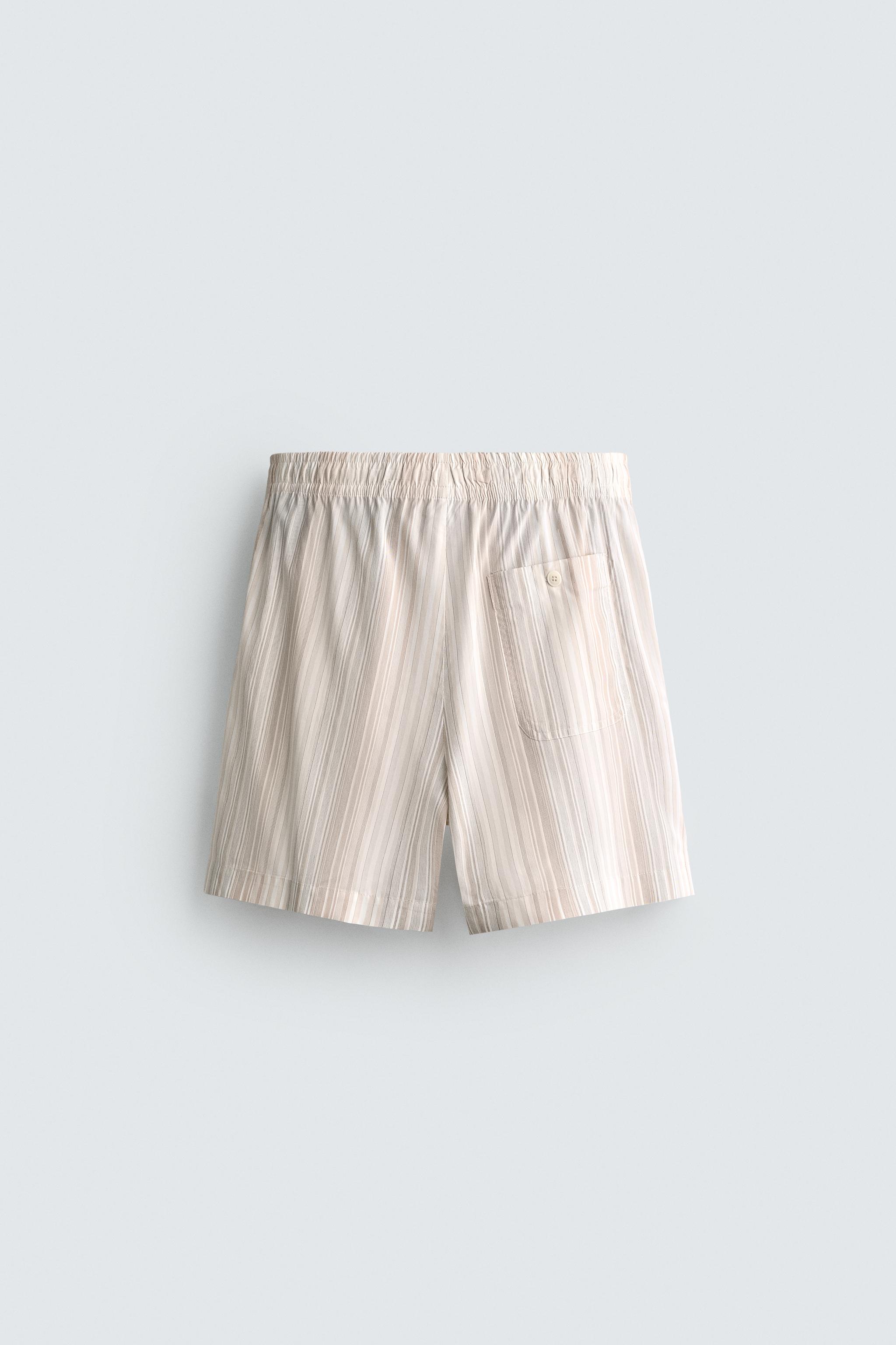 STRIPED RELAXED FIT SHORTS
