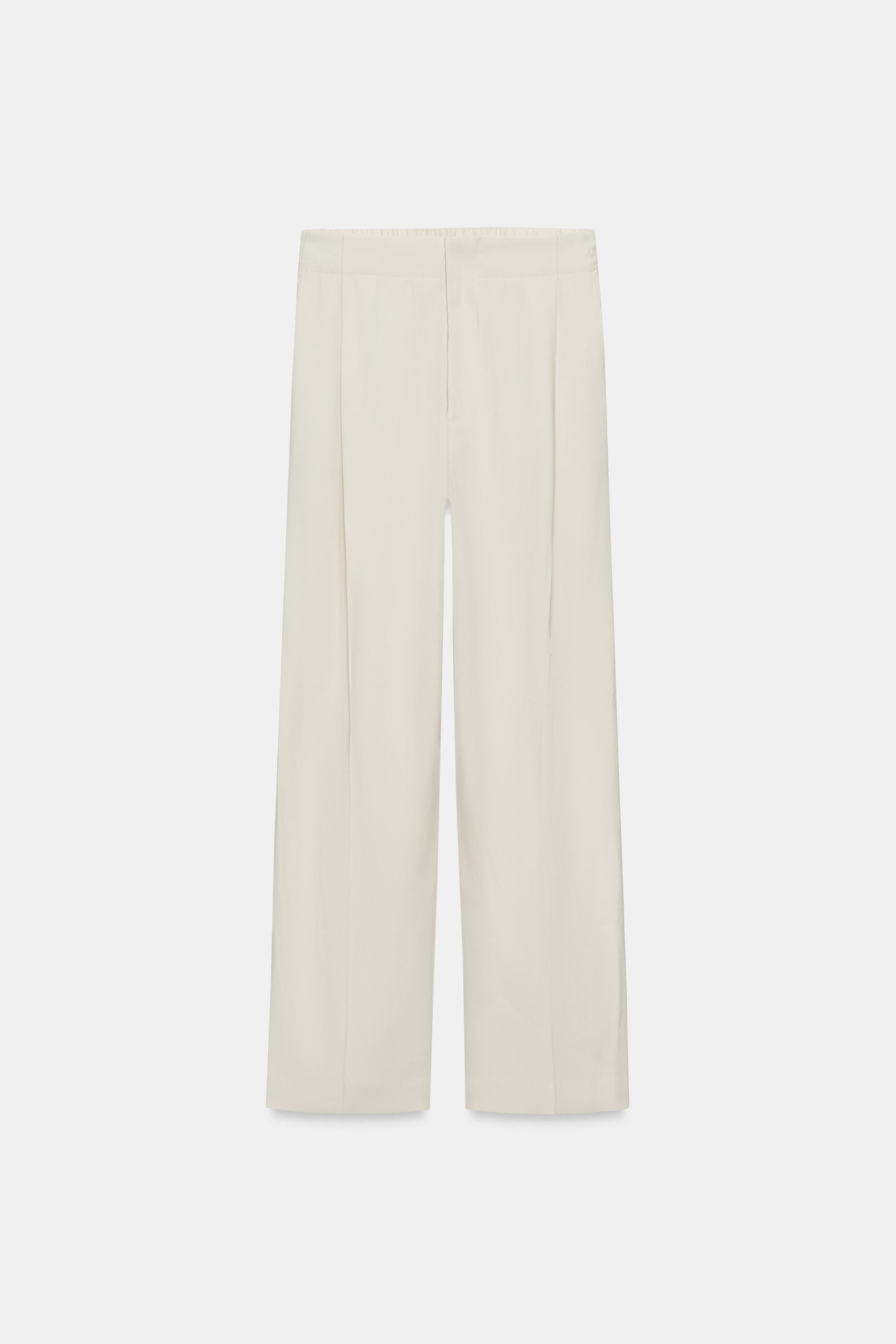 PLEATED FLOWY PANTS