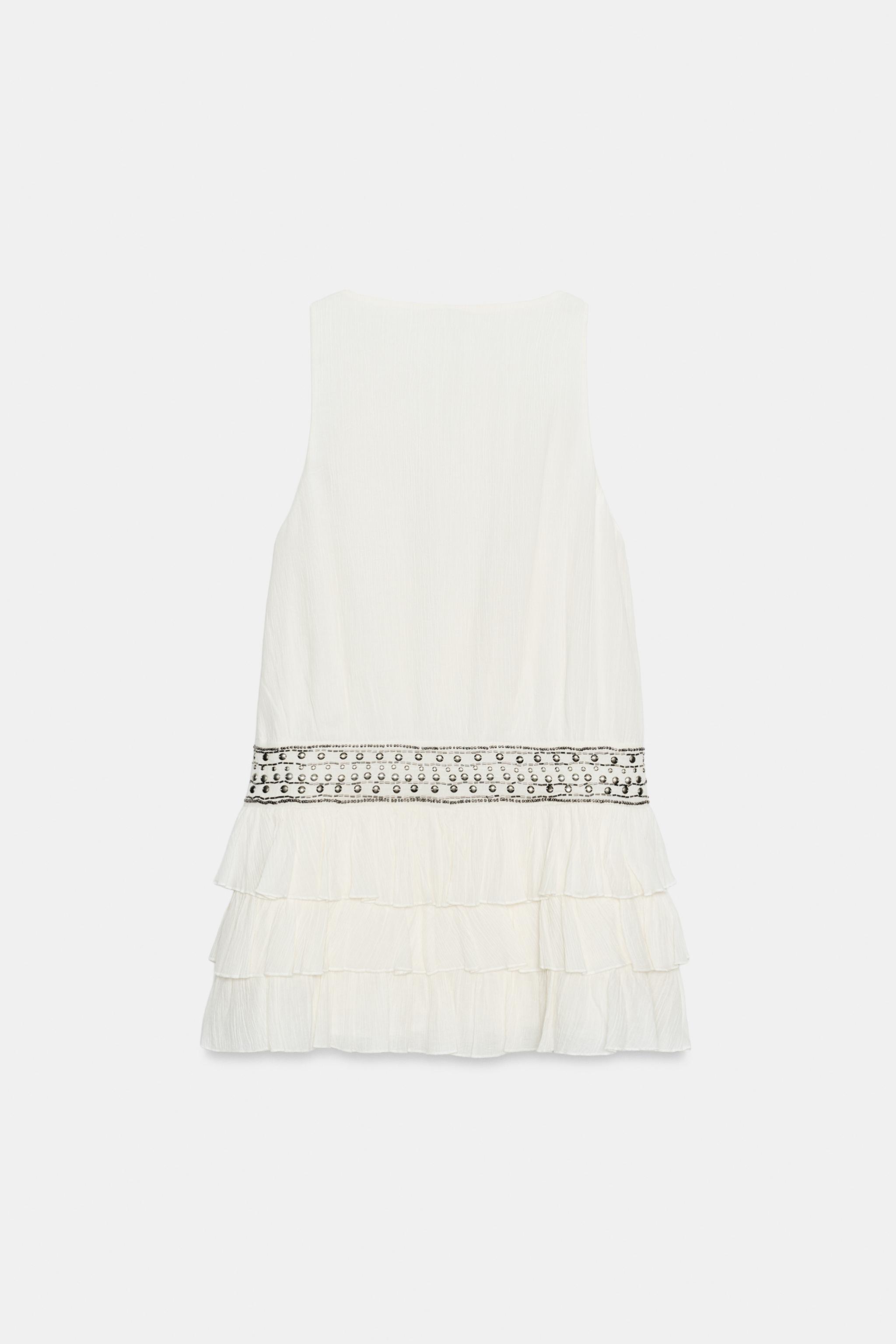 ROBE GAZE VOLANTS CLOUS