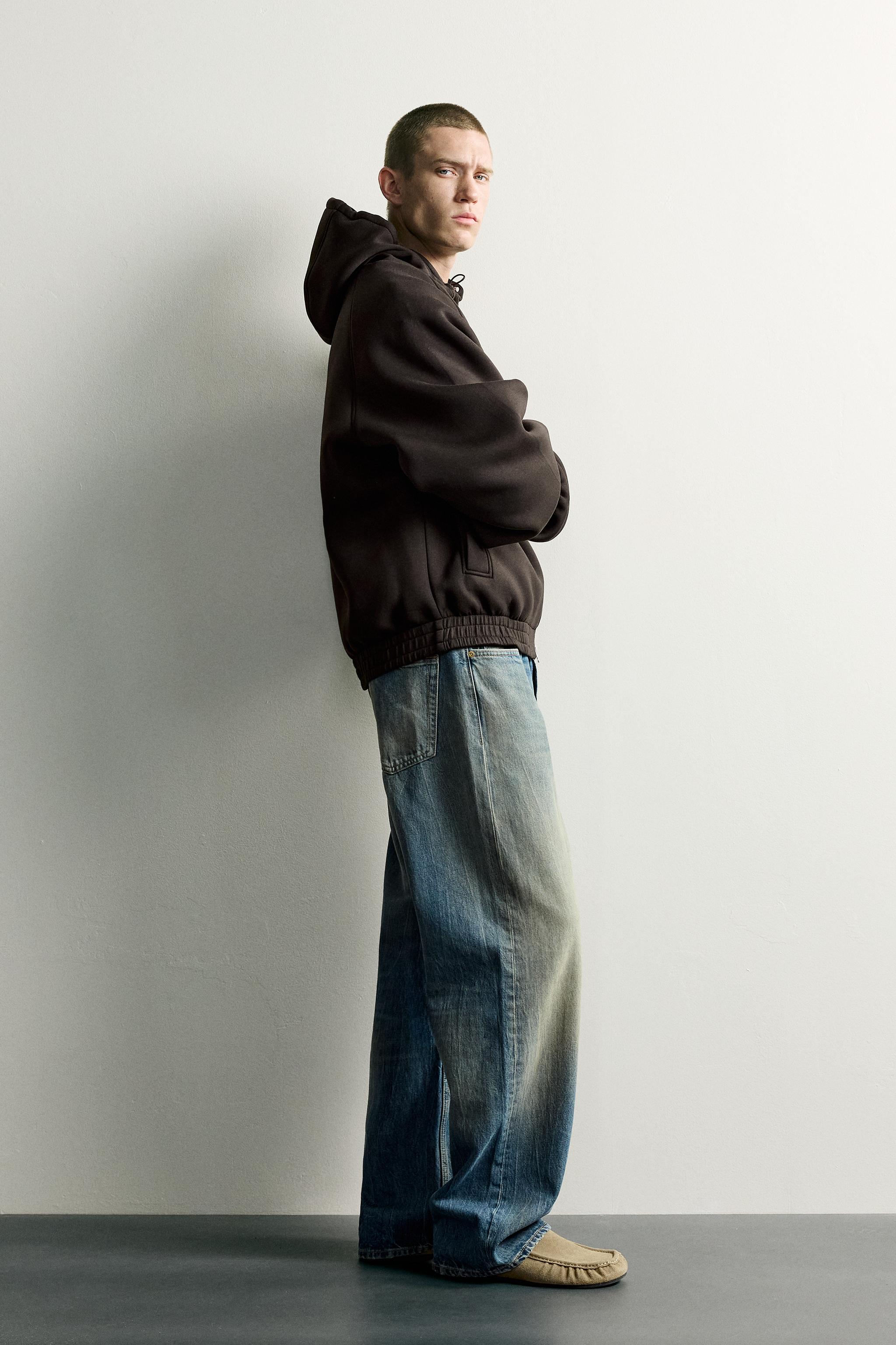 VESTE TECHNIQUE À CAPUCHE RELAXED FIT
