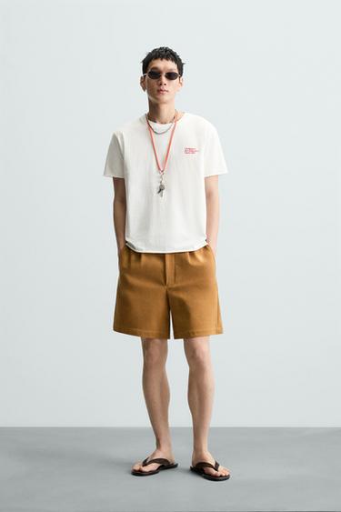 CAMISETA TEXTO ESTAMPADOS LAVADOS - Blanco roto de Zara - Imagen 0