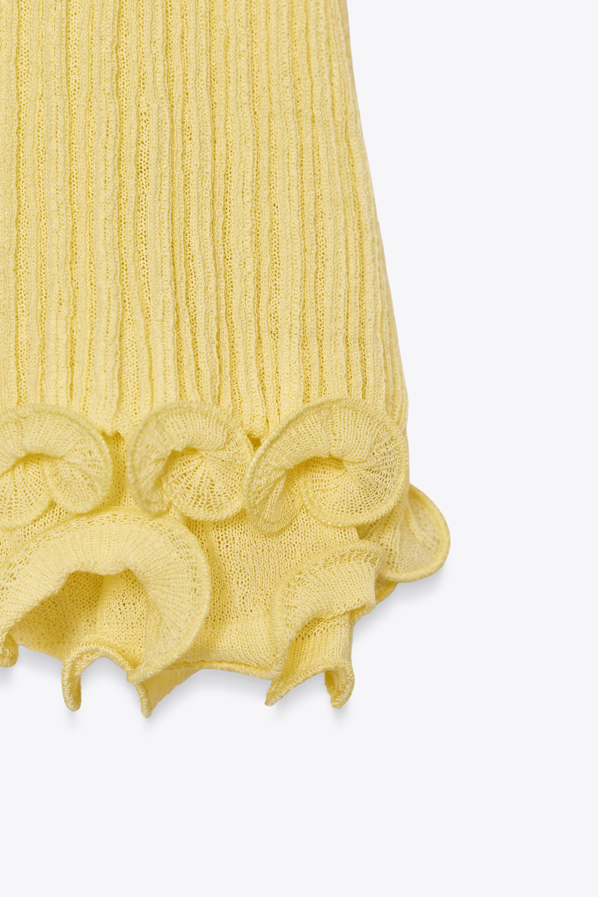 WAVY HEM KNIT TOP