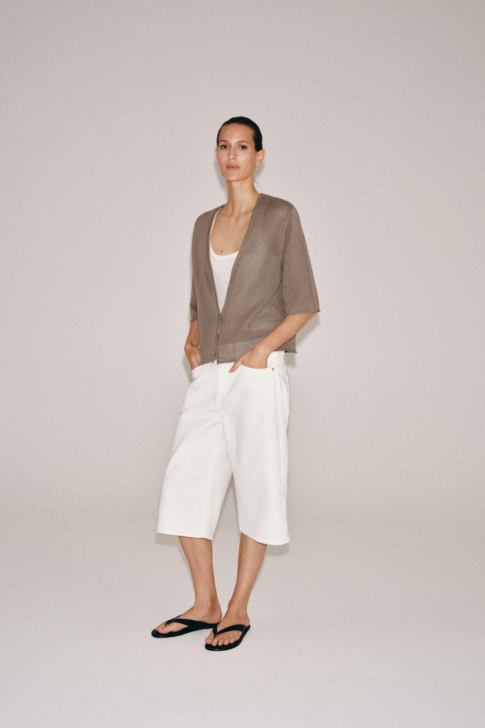 GILET EN MAILLE À MANCHES LARGES